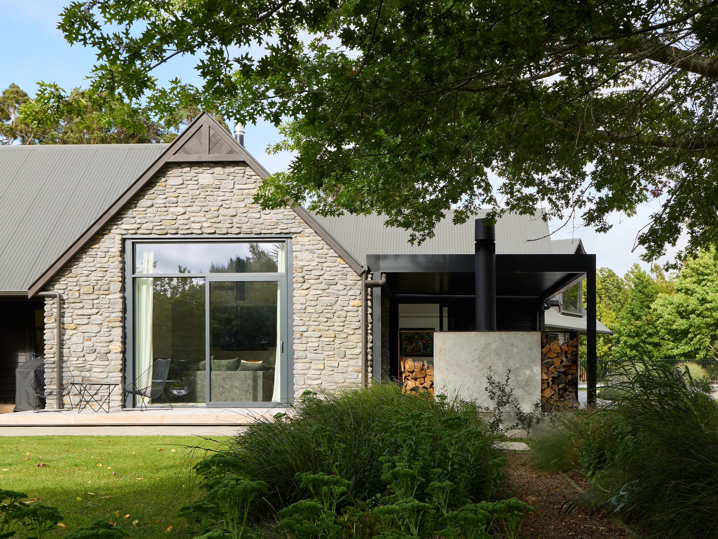 Greenslade Residence Tai Tapu – lakeside home alteration with oak, cedar and clay plaster interiors by AW Architects (2026)