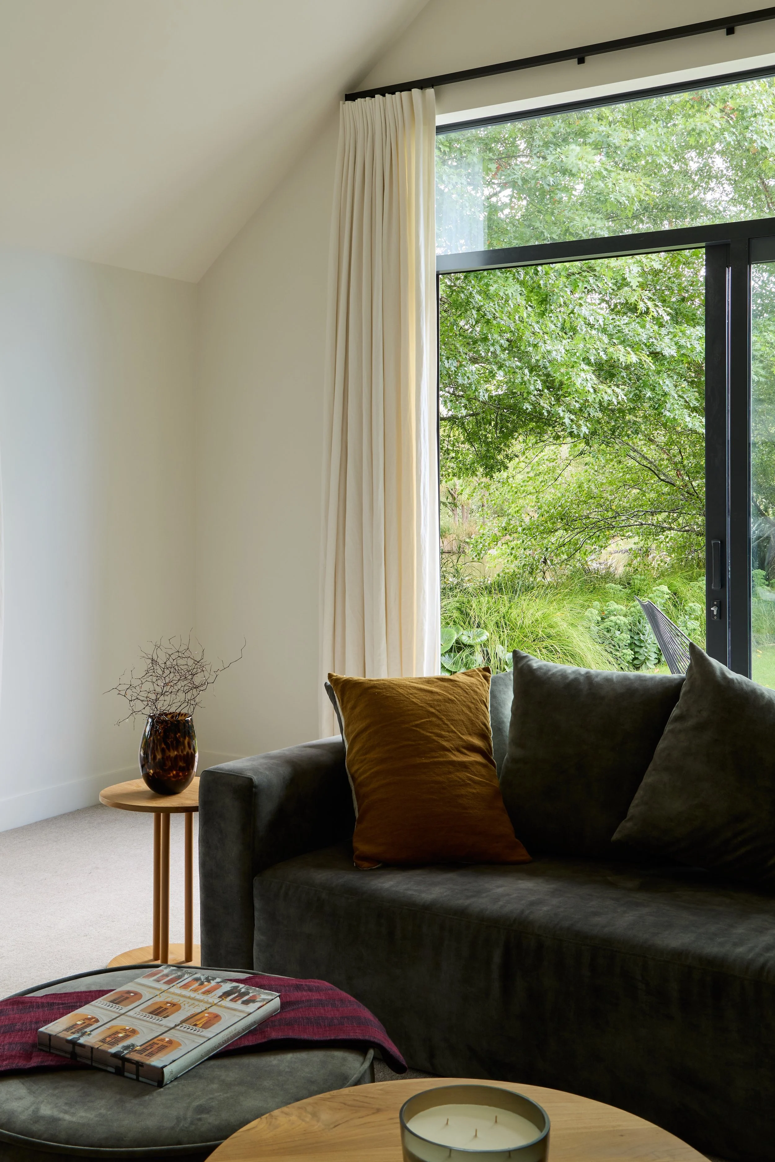 Greenslade Residence Tai Tapu – lakeside home alteration with oak, cedar and clay plaster interiors by AW Architects (2026)