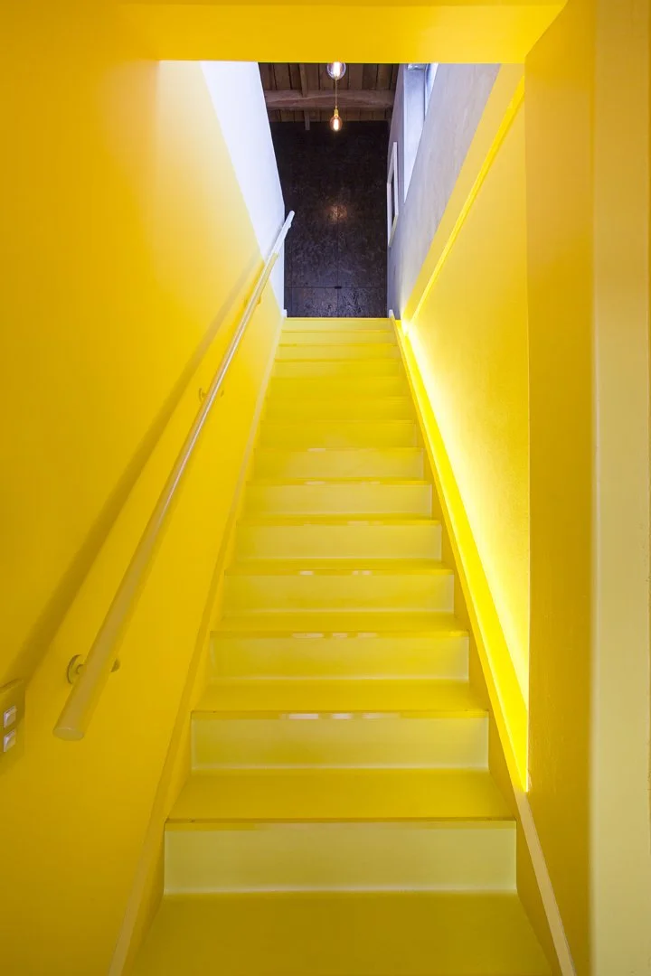 St Asaph Studio – Christchurch shared office with exposed rimu and bold colour by AW Architects & Deflux (2015).