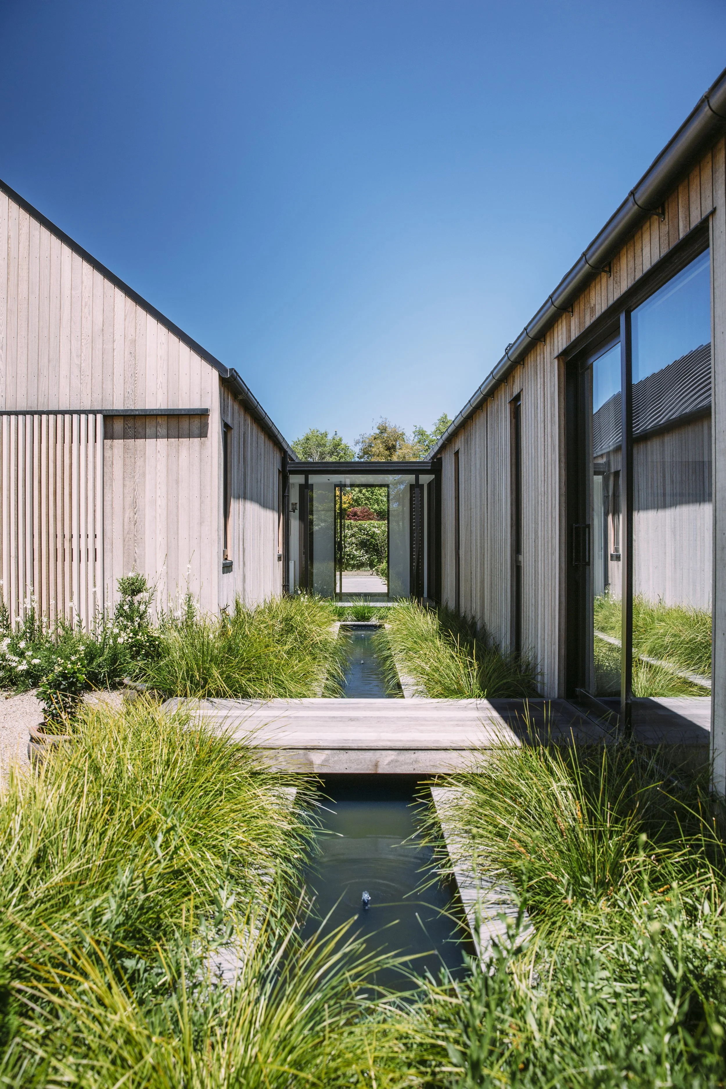 Fendalton riverside house with cedar cladding – AW Architects NZIA 2022