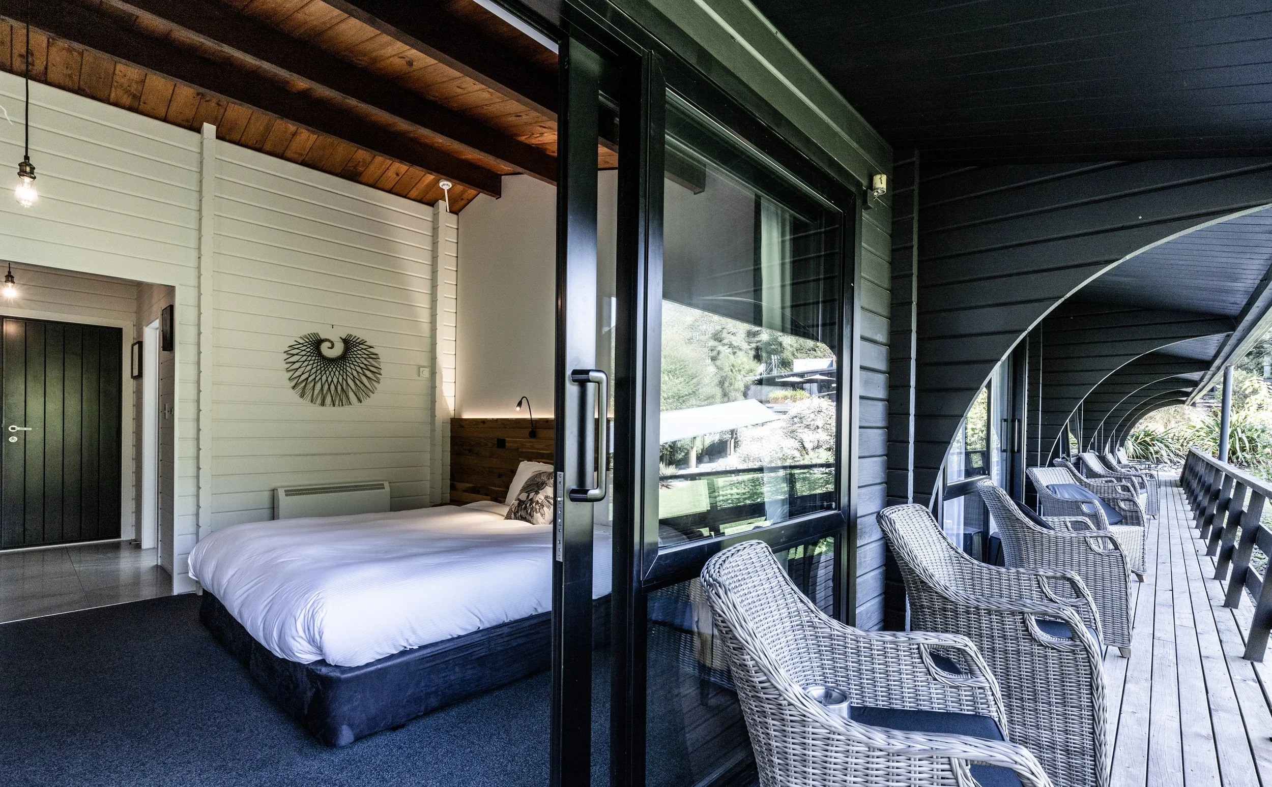Maruia Hot Springs – alpine resort renovation with timber and stone interiors by AW Architects (2017)