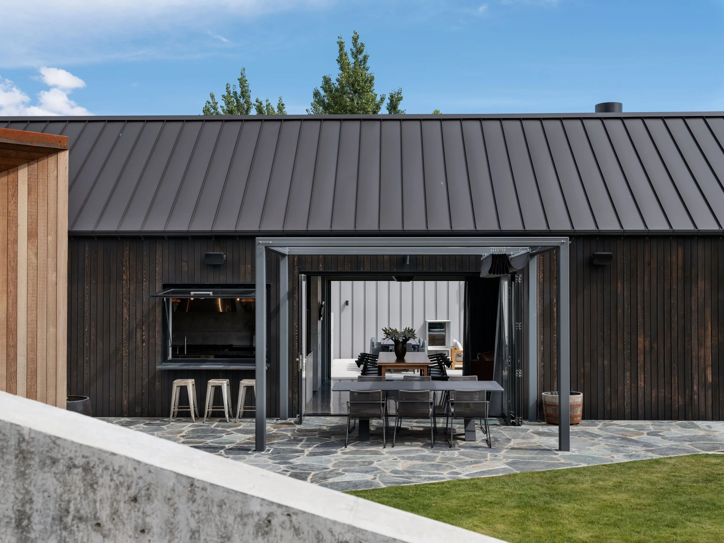 Arrowtown Queenstown house with three pods around courtyards – AW Architects NZIA 2021