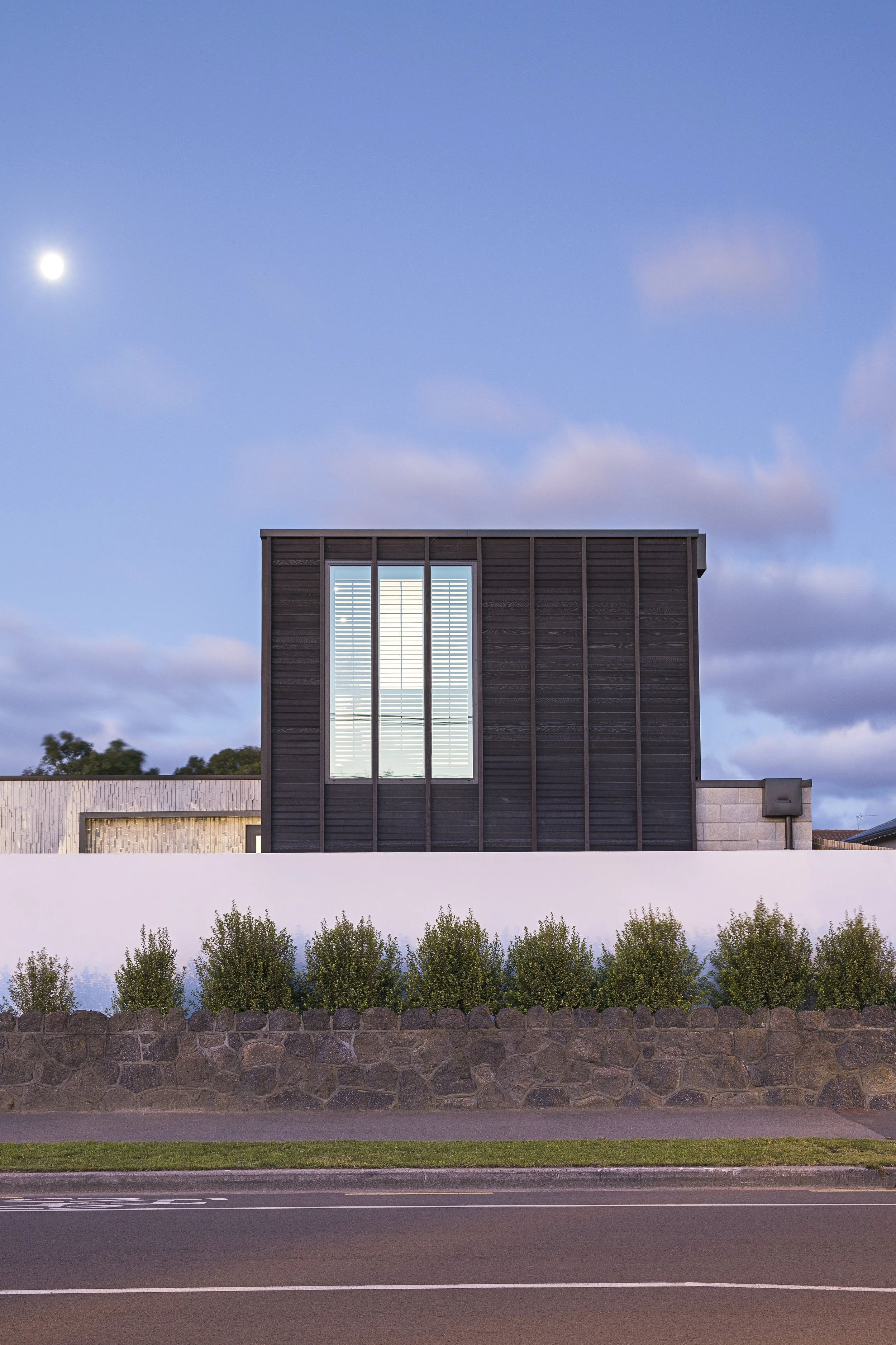 Barrington St House – timber-clad Christchurch residence with dramatic street frontage by AW Architects (2016)
