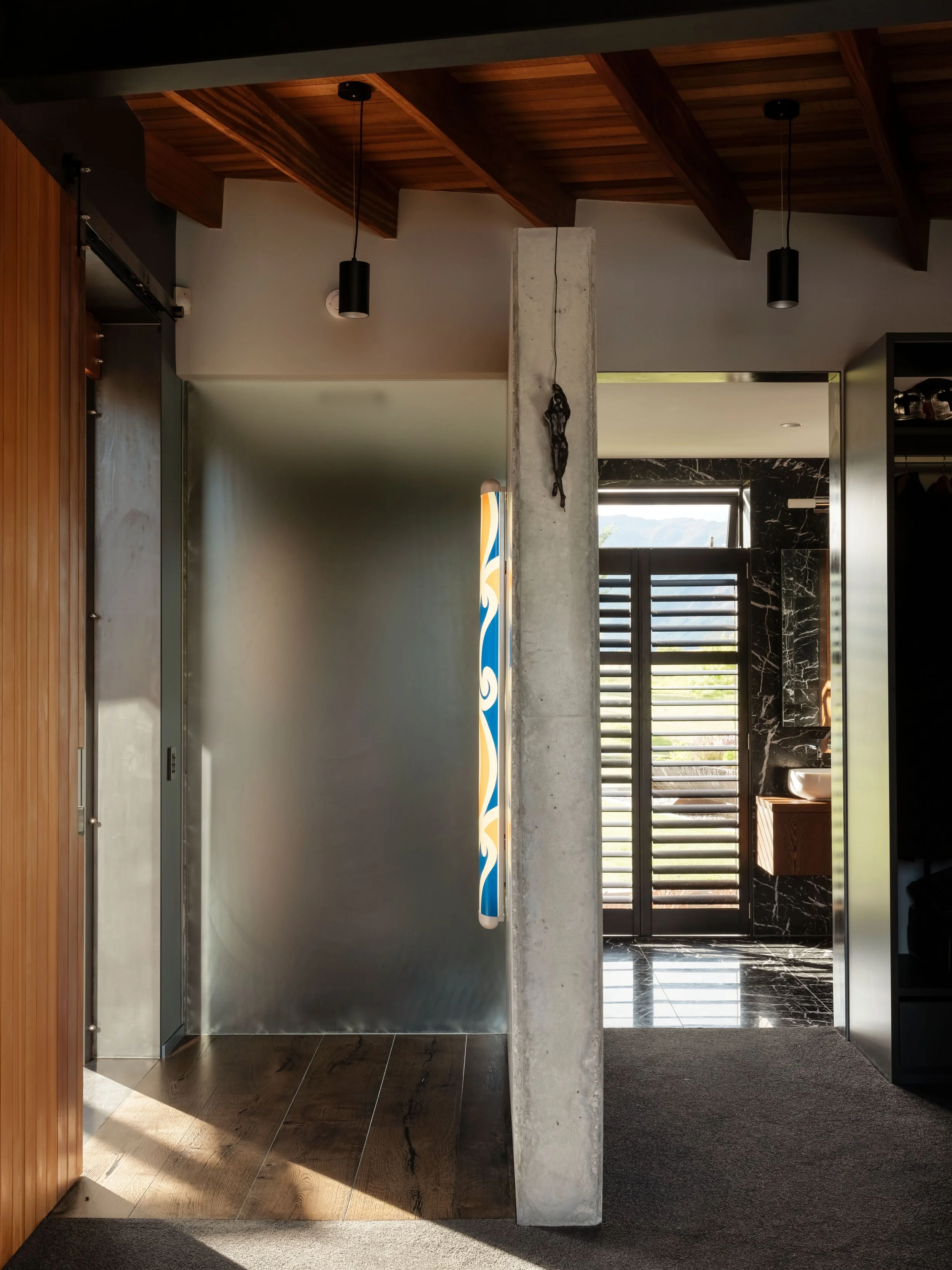 Arrowtown Queenstown house with three pods around courtyards – AW Architects NZIA 2021