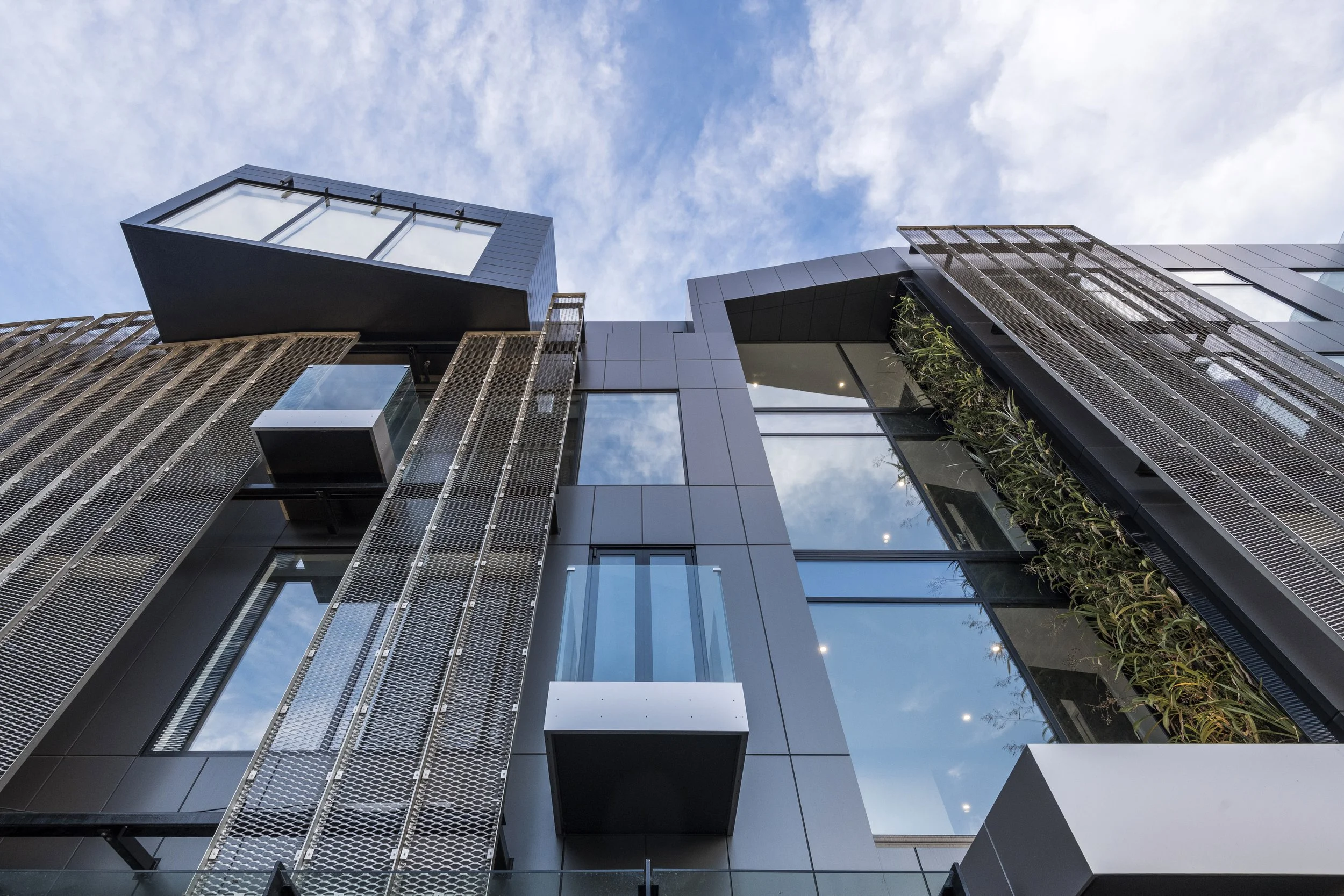 Cashel Mall Christchurch multi use commercial rebuild with bronze fins – AW Architects
