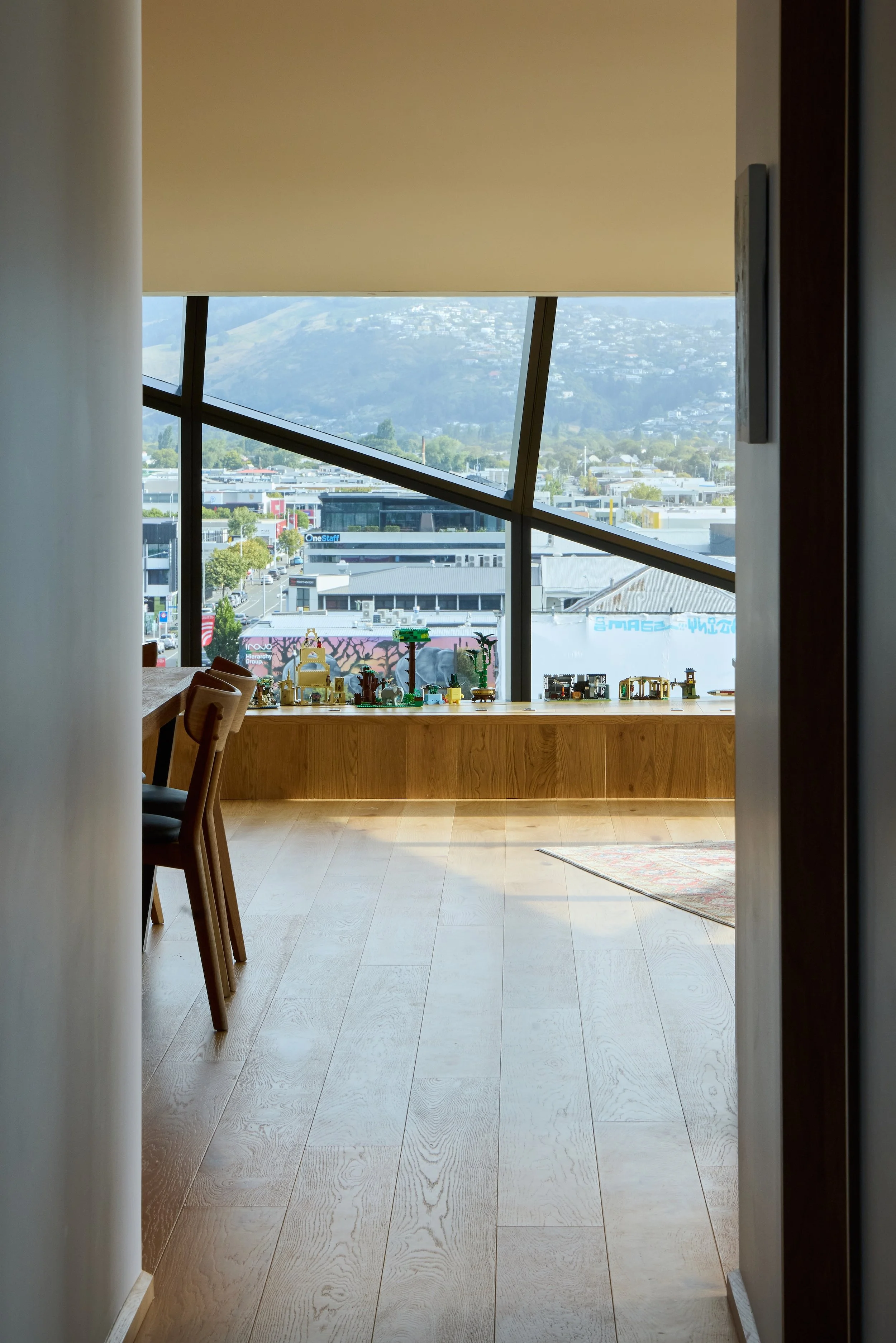 City Residence Ōtautahi Christchurch – Level 6 city apartment with folding roof and Port Hills views by AW Architects (2026)