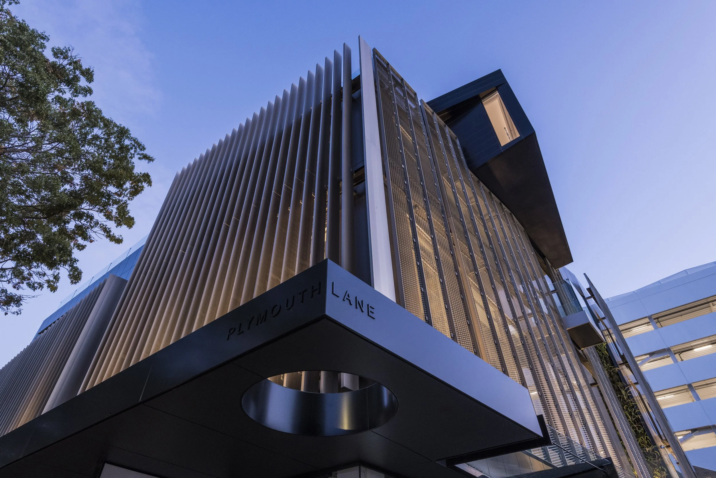 Cashel Mall Christchurch multi use commercial rebuild with bronze fins – AW Architects