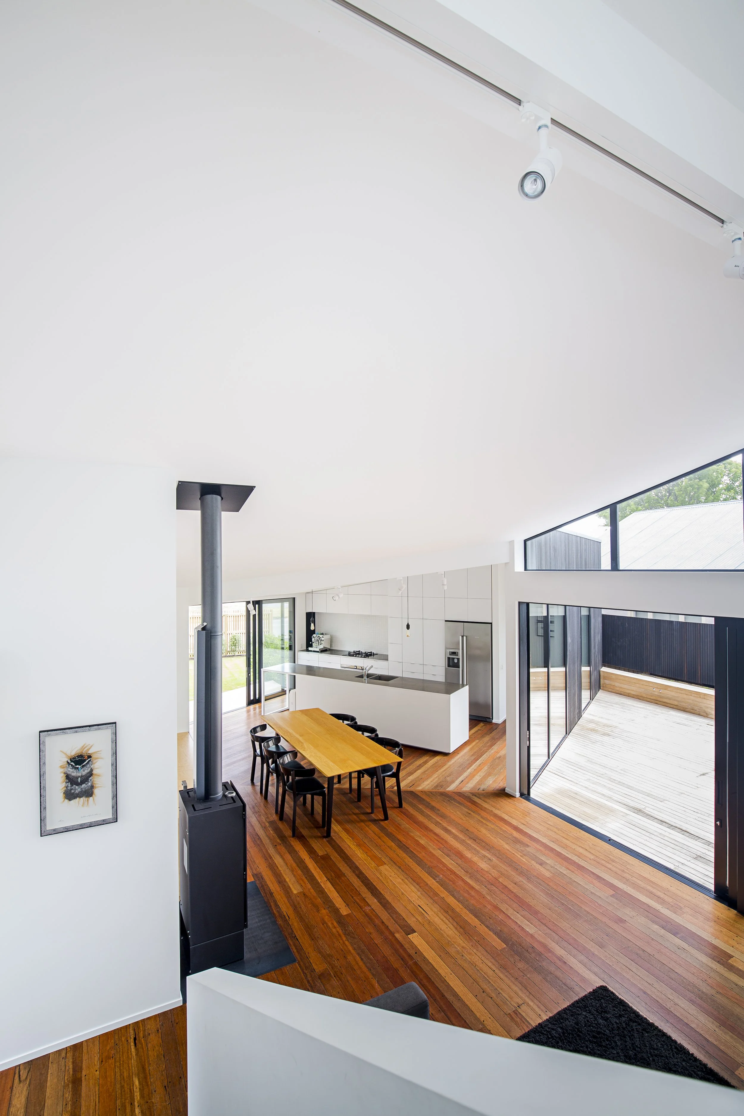 Sumner House – Christchurch rebuild home with maple courtyard and recycled materials by AW Architects (2016)