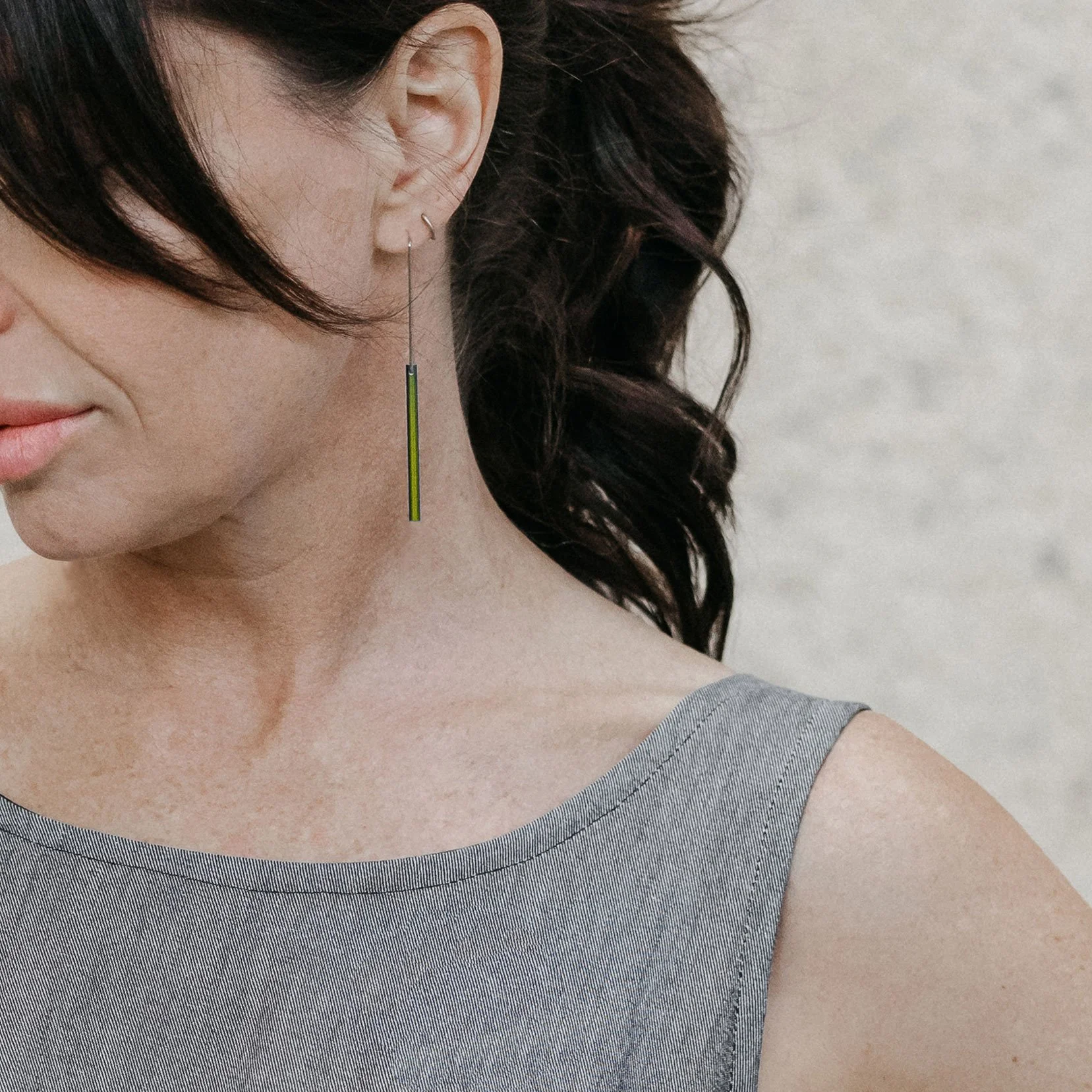 Hidden-line-earrings-olive-worn.jpg
