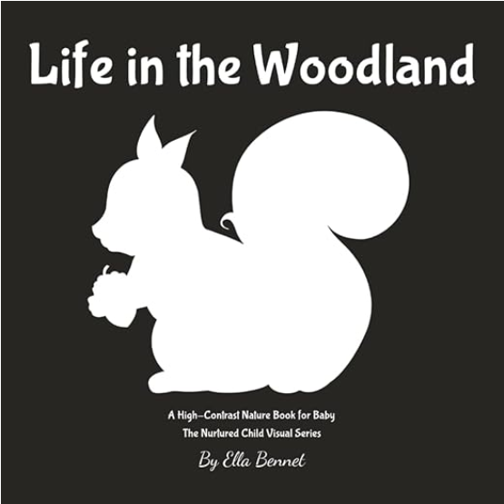 Book cover titled 'Life in the Woodland' featuring a white silhouette of a squirrel holding an acorn against a black background.