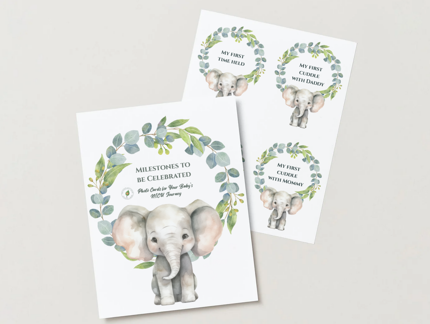 Set of milestone photo cards for a baby's NICU journey with illustrations of a cute baby elephant surrounded by green foliage, each card with different milestones and captions for first time held, cuddles with daddy and mommy.