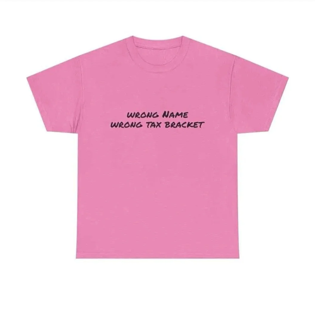 Pink T-shirt with black text that reads 'Wrong Name Wrong Tax Bracket'.