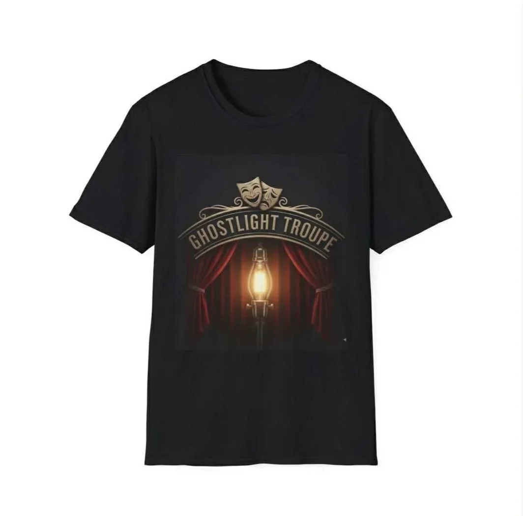 Black T-shirt with theatrical design featuring red curtains, a spotlight, and comedy and tragedy masks, with the text 'Ghostlight Troupe'.