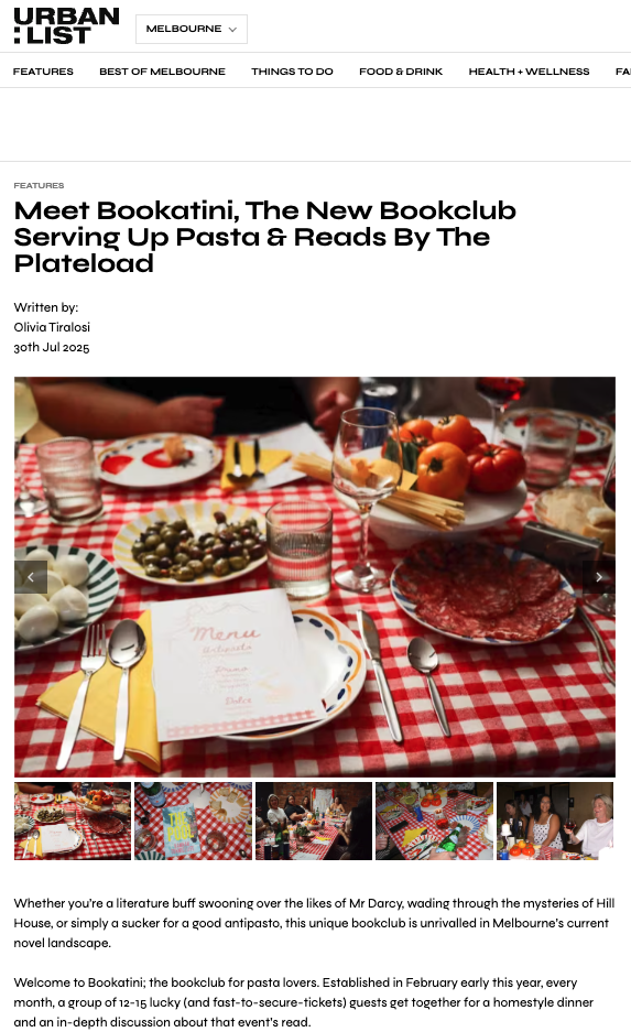 Table set with plates, glasses, cutlery, and a menu on a red and white checkered tablecloth, featuring various foods including olives, tomatoes, cheese, and cured meats.