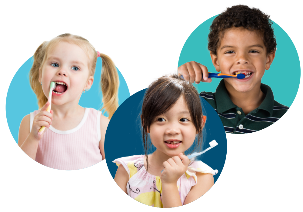 Kids brushing their teeth during a dental hygiene lesson supported by Empowered Smiles Initiative