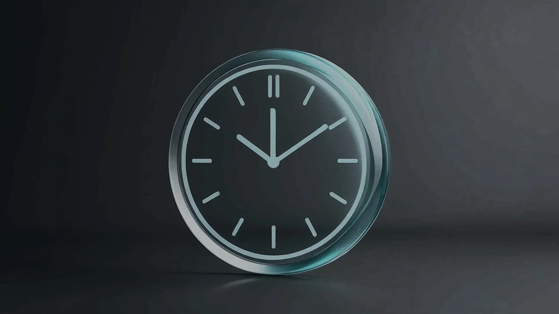 A modern, round glass desk clock showing the time as 11:09, set against a dark background.