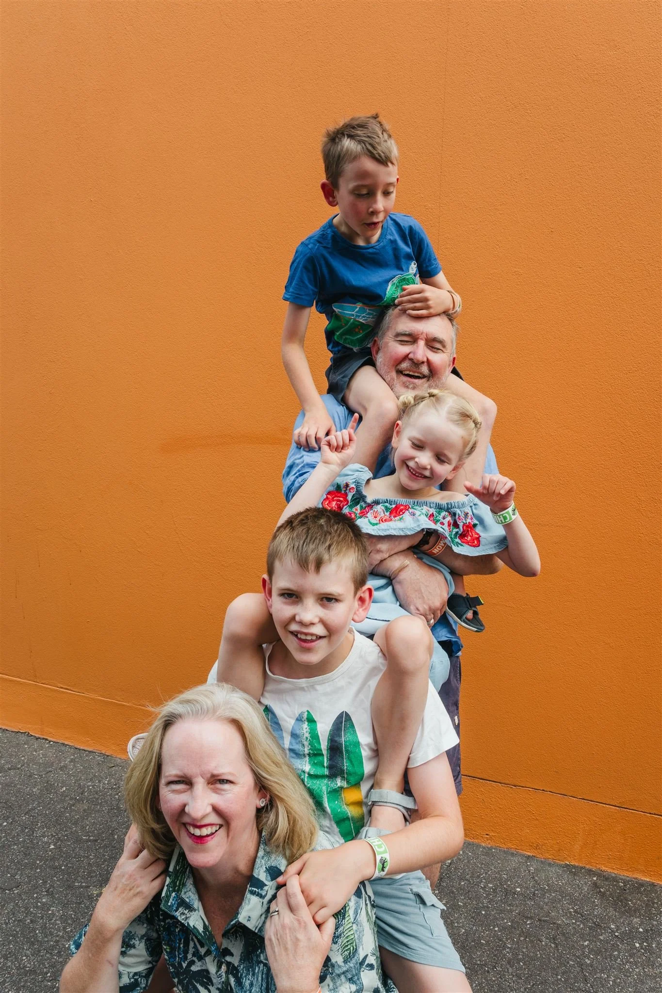 4. See if you can all stack on top of one another to create a weird family tower.