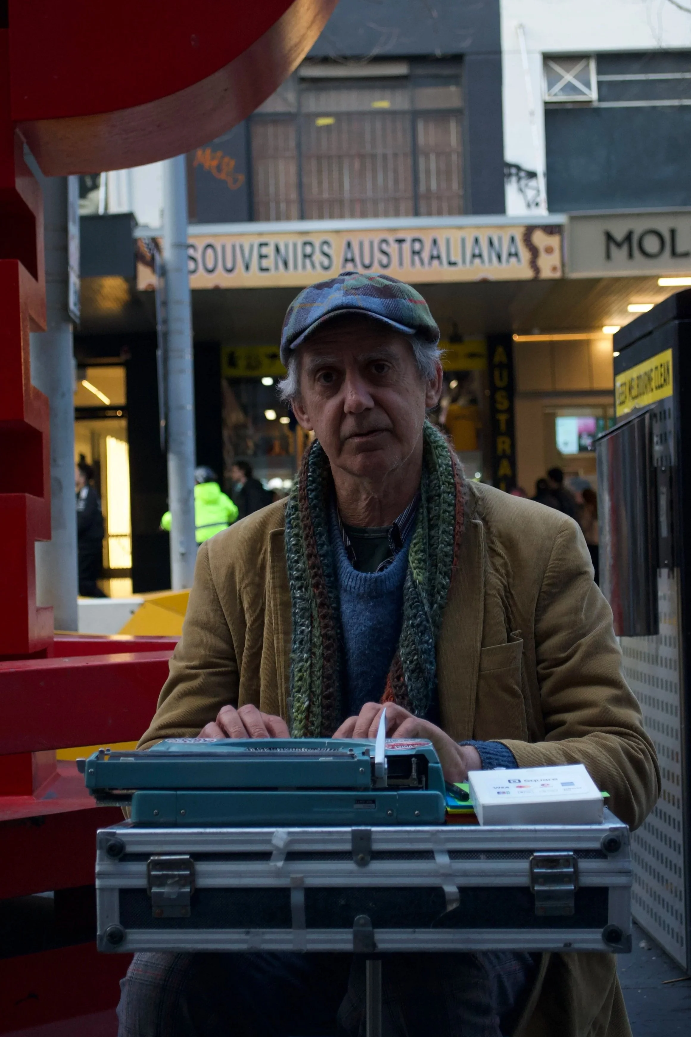 A Street performer who uses a typewriter to write poems for people who are interested on Swanston Street (30.08.2025)