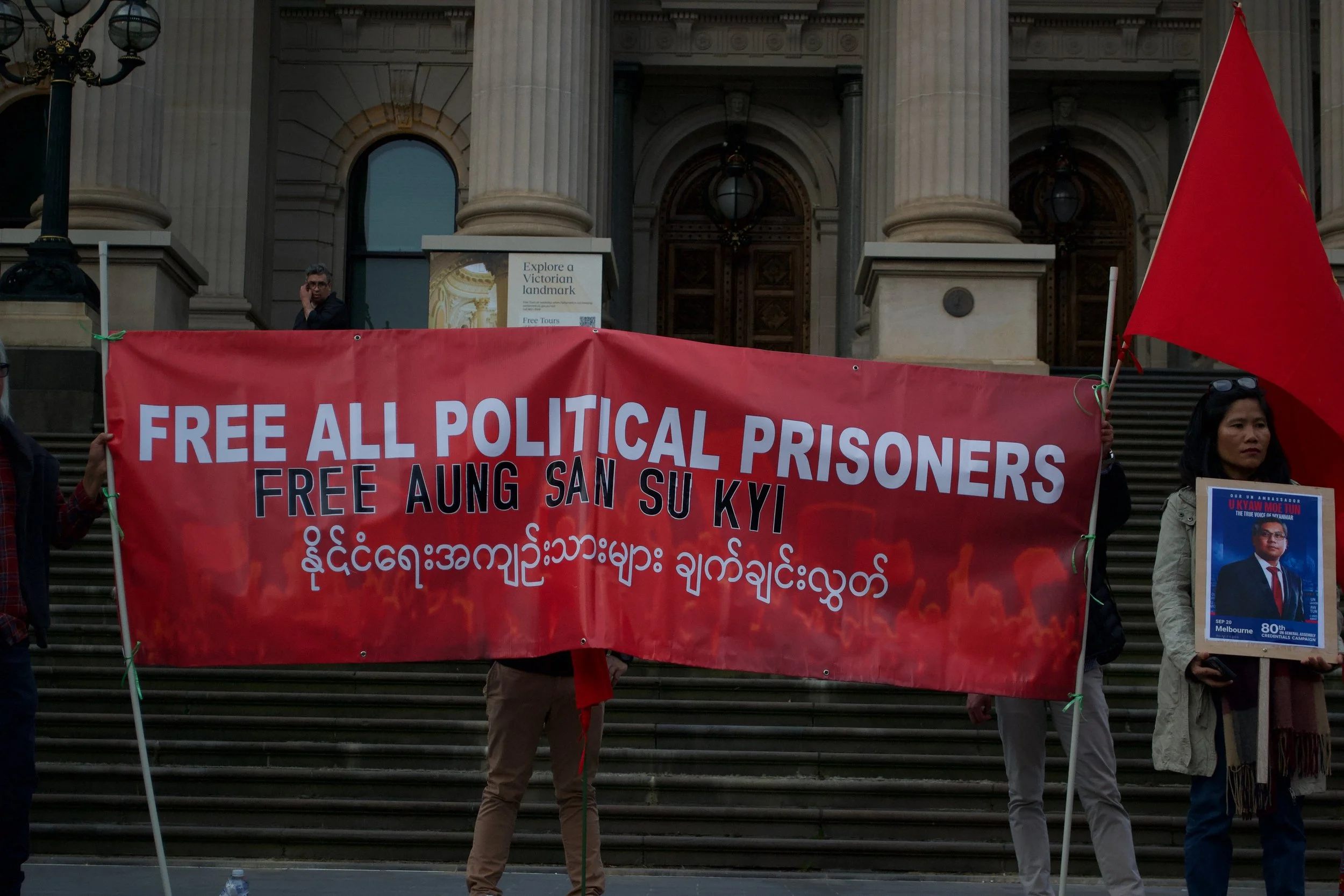A protesters banner stating 'Free All Political Prisoners Free Aung San Su Kyi' 06.09.2025