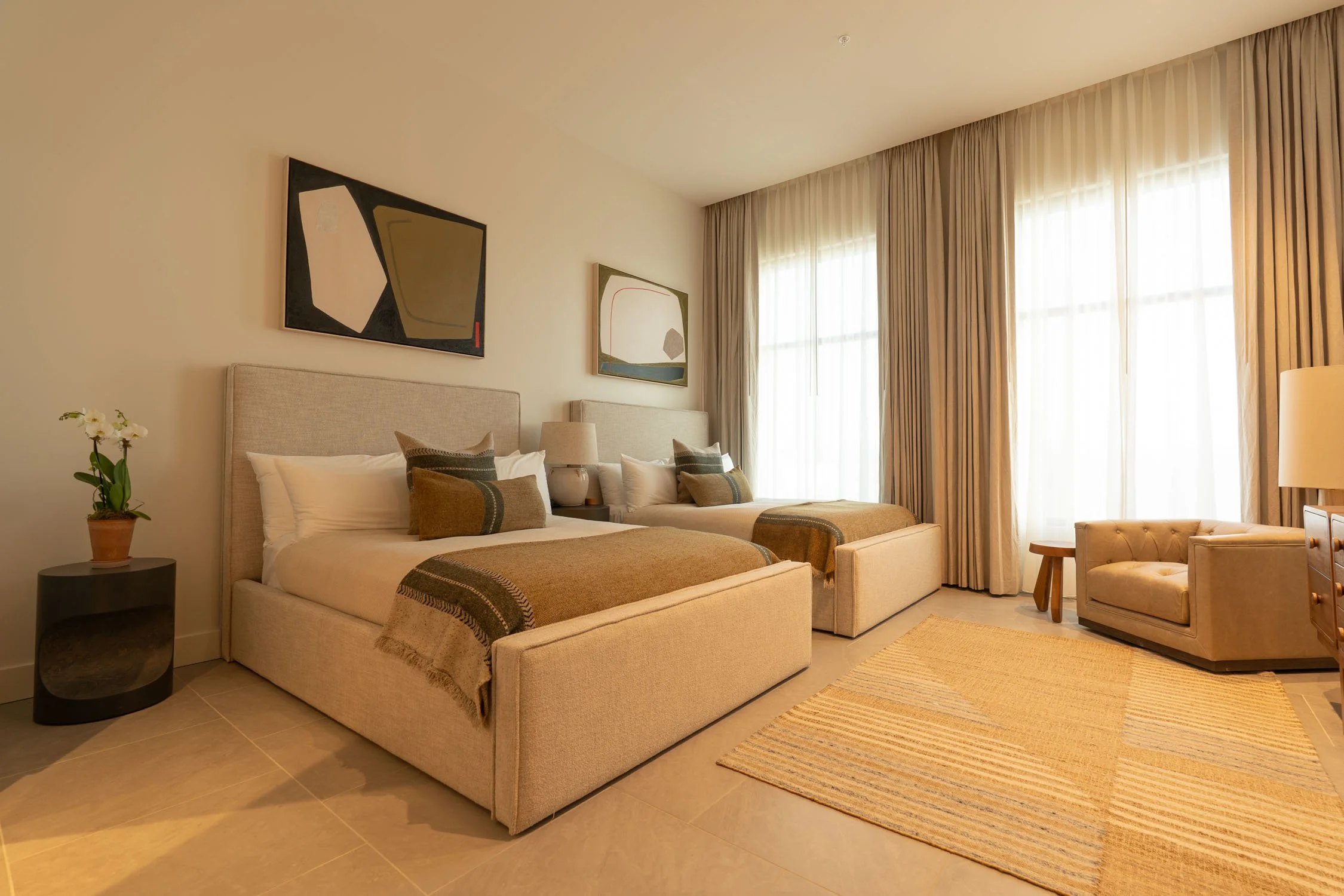 Double Queen room at The Sitio, a Virginia Beach hotel with modern interior design and Libeco Belgian fine linens