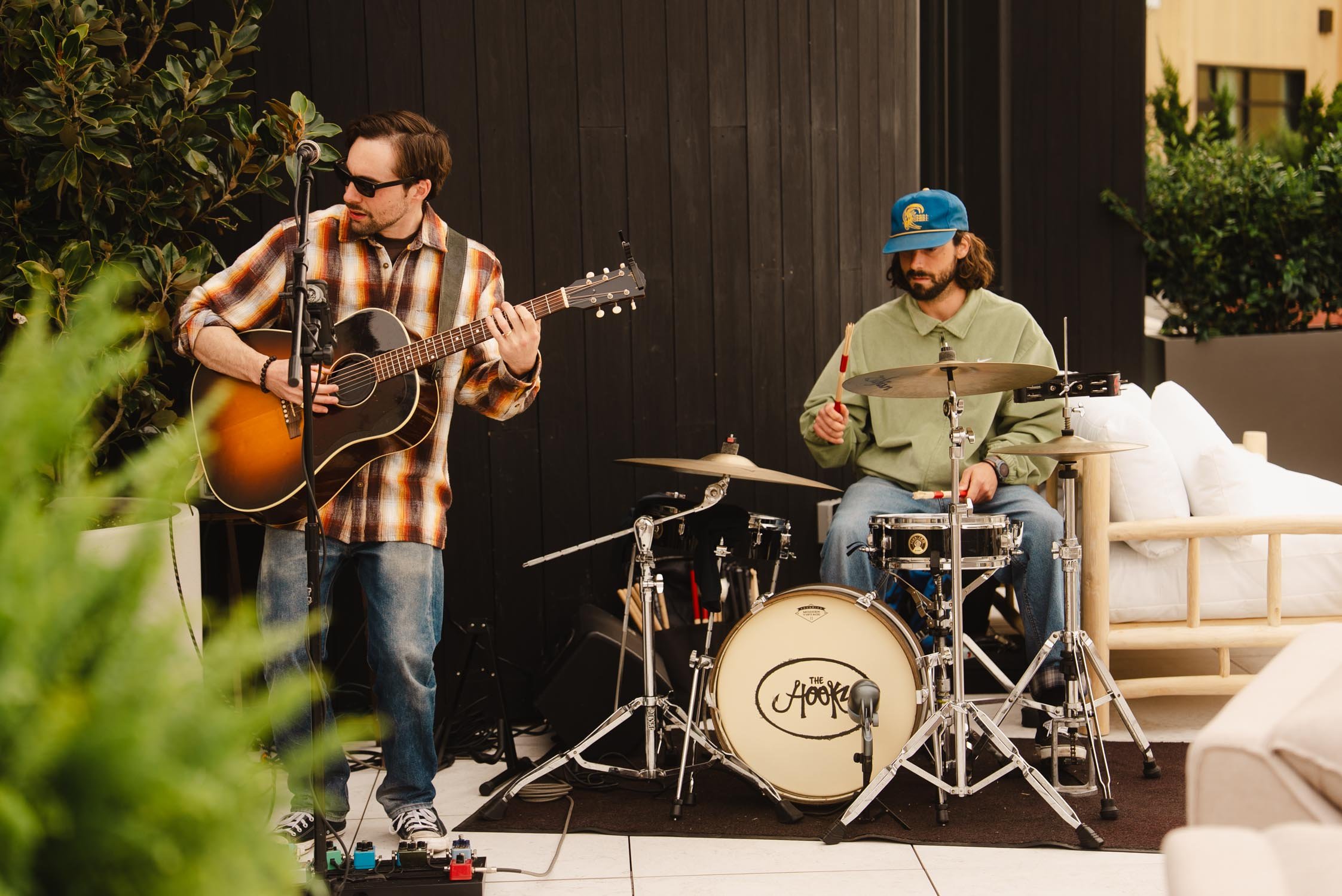 Band playing outdoors at The Sitio during a live event at Atlantic Park, Virginia Beach hotel