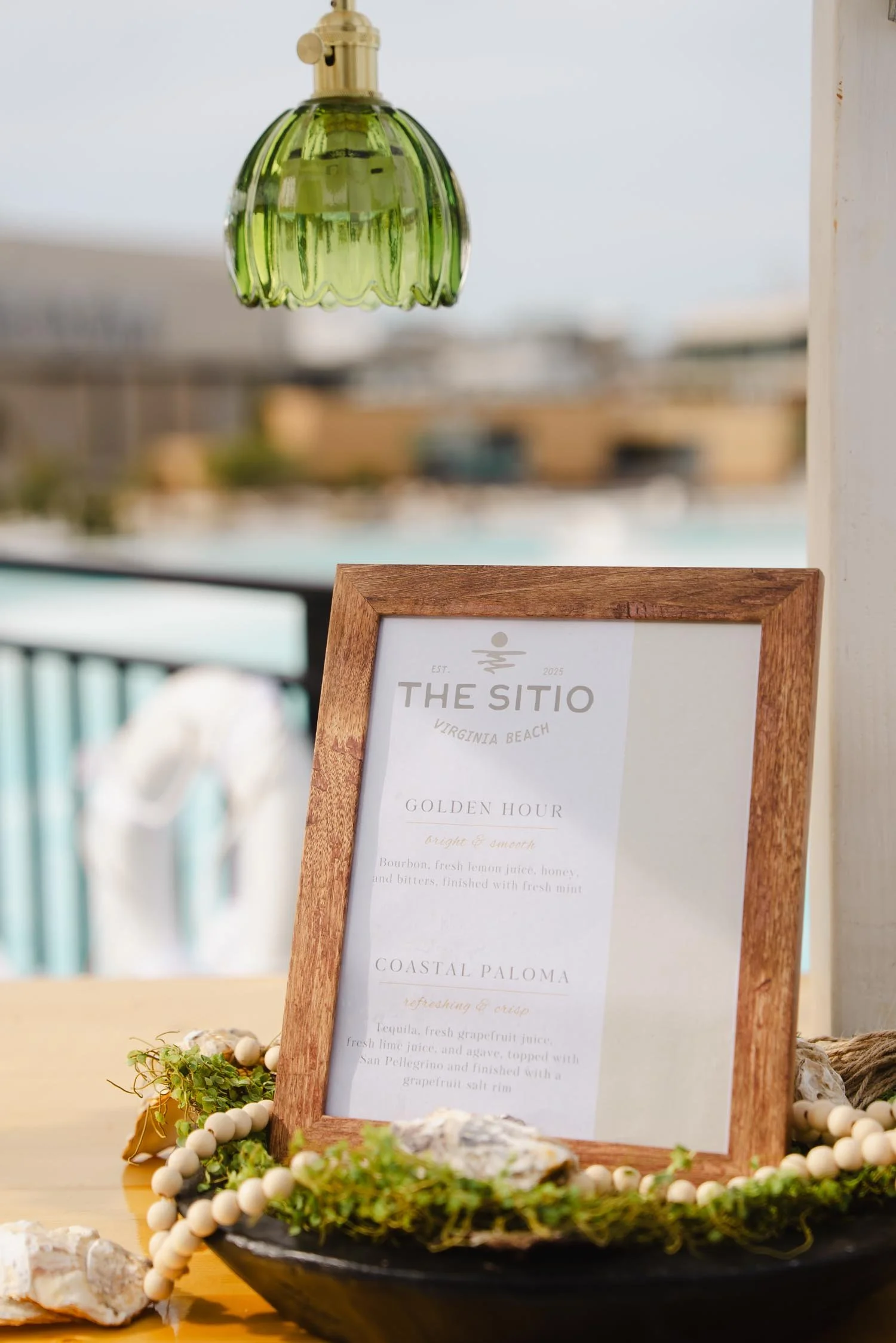 Poolside bar menu signage at The Sitio, a Virginia Beach boutique hotel