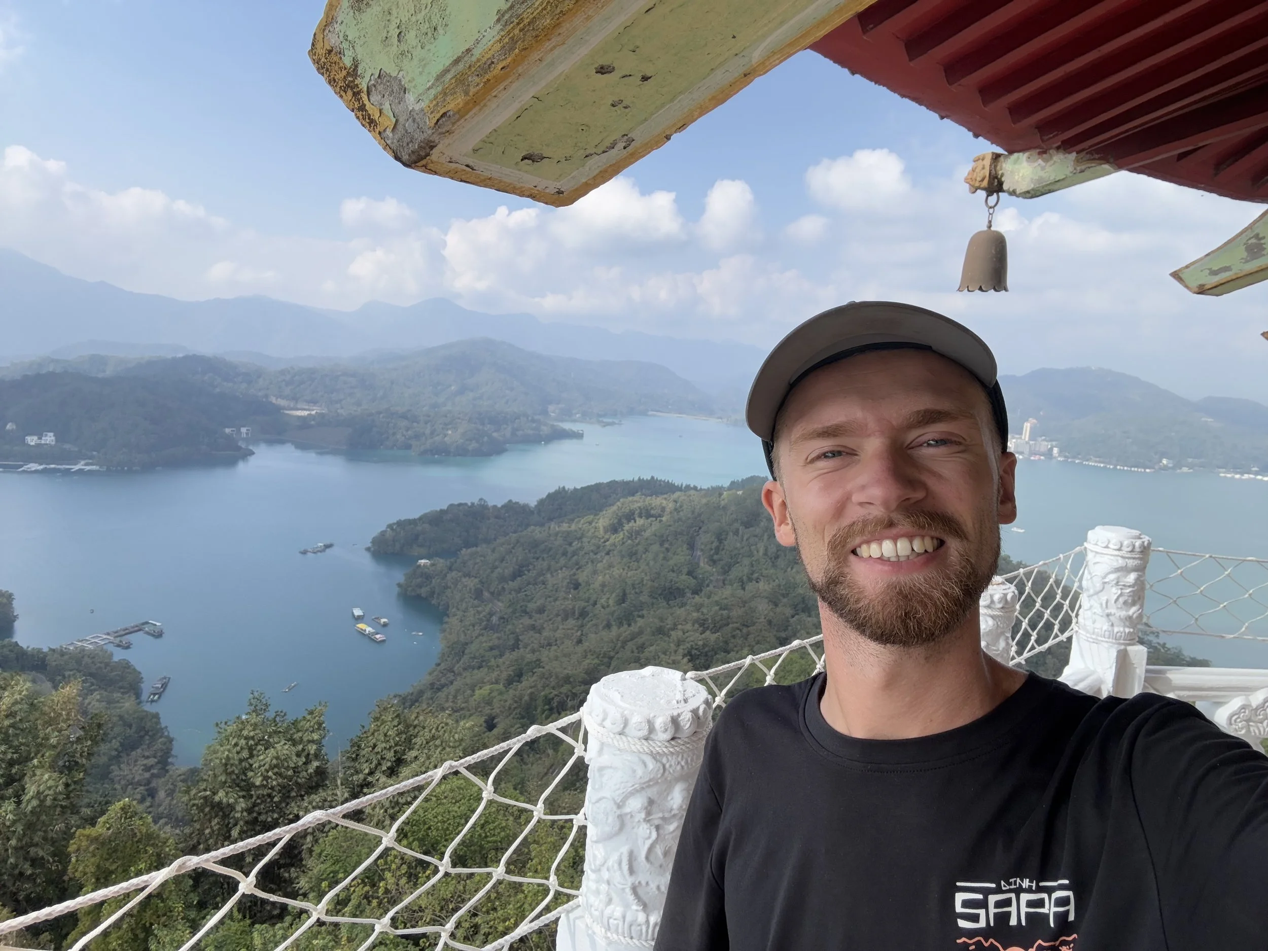 A selfie of David Worldwide on top of the T'zu-en Pagado at Sun Moon Lake in Taiwan