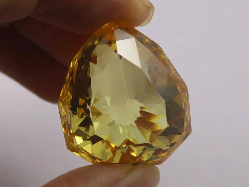 etailed close up of the 137 carat Florentine Diamond with its distinctive yellow colour and historic rose cut.