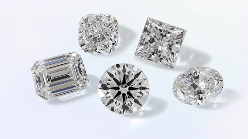 Group of lab grown diamonds displayed under neutral lighting, highlighting their clarity, cut and modern production origins.