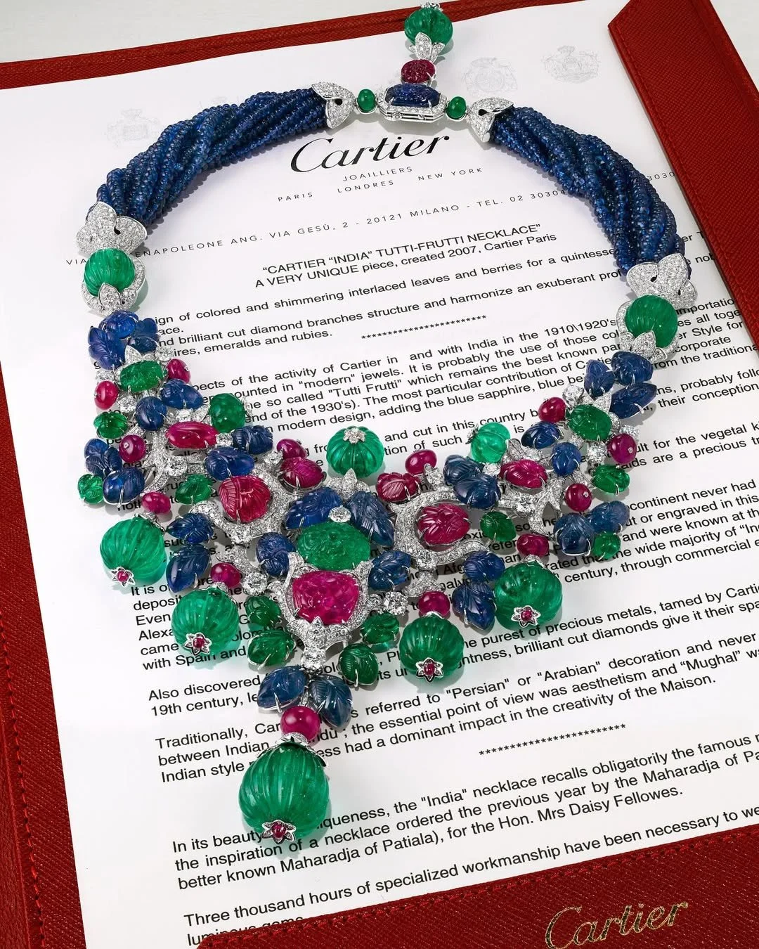 Cartier Tutti Frutti gem-set and diamond demi-parure featuring carved emeralds, rubies and sapphires, sold at auction for 25,860,000 HKD.