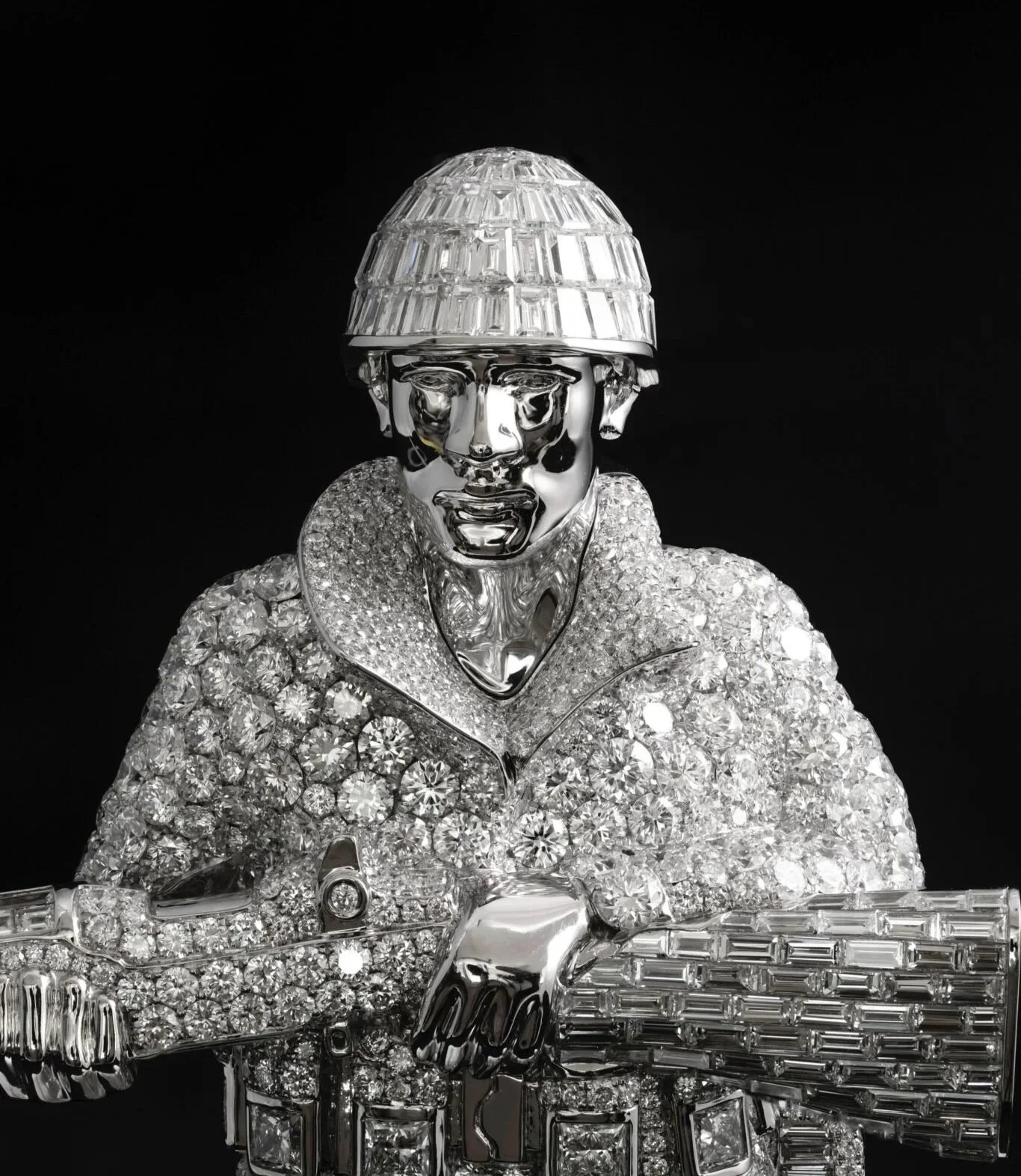 Custom Skating Soldier diamond chain designed by A Jewellers for Afrobeats star Asake, crafted in 600 grams of white gold and set with 213.45 carats of VVS diamonds, featuring a soldier on a skateboard pendant suspended from a bullet-link chain.