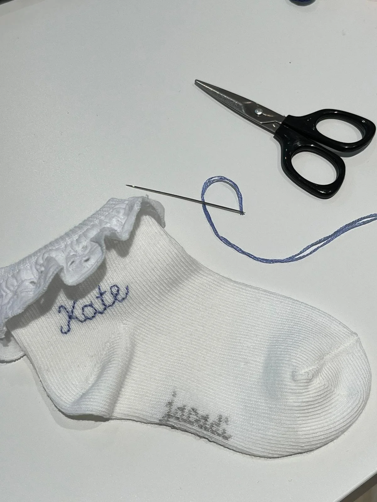 Activation broderies personnalisées pour un évènement presse / influence pour Jacadi.