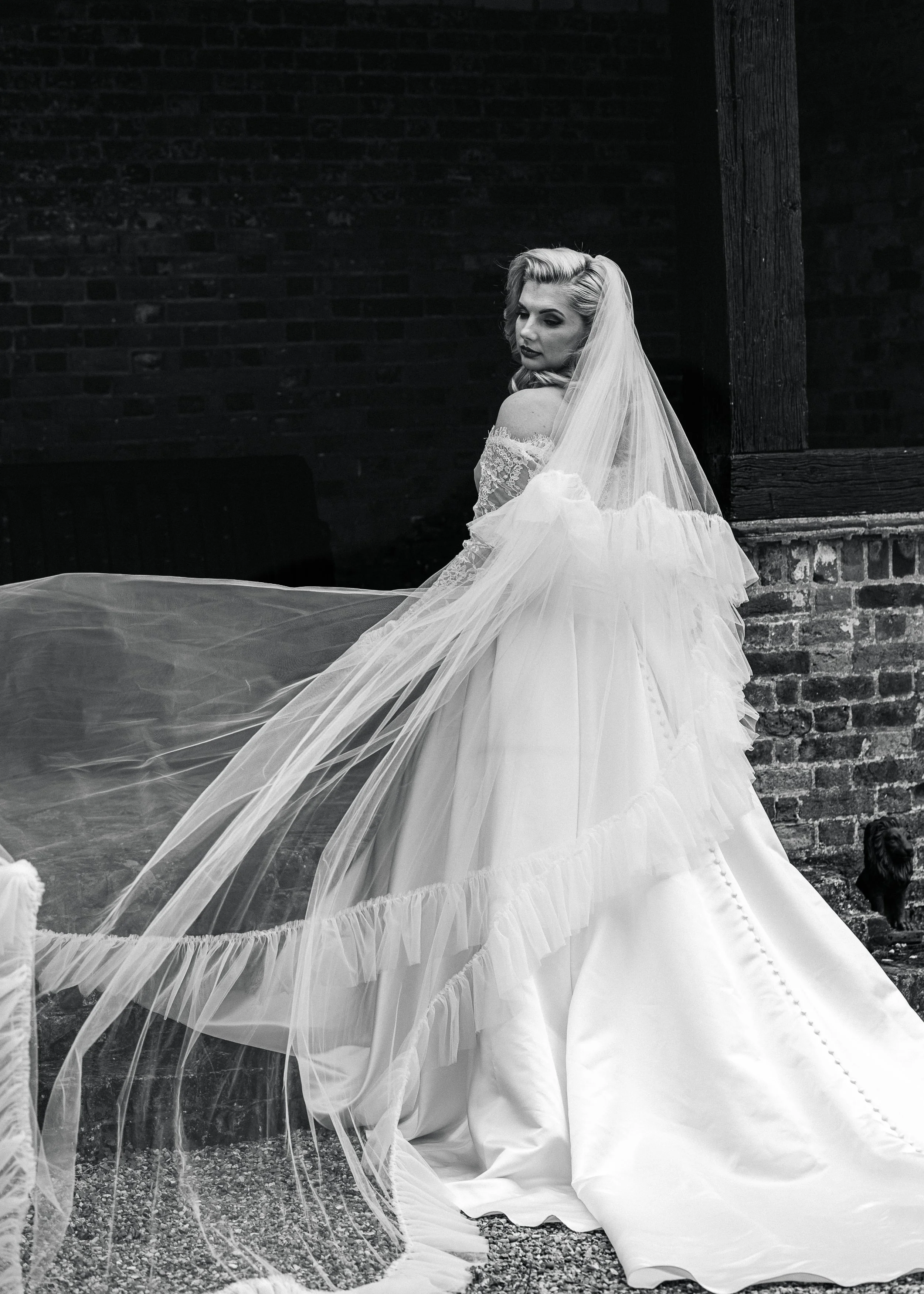 A Bride with a flowing veil at Offley Place in Hertordshire