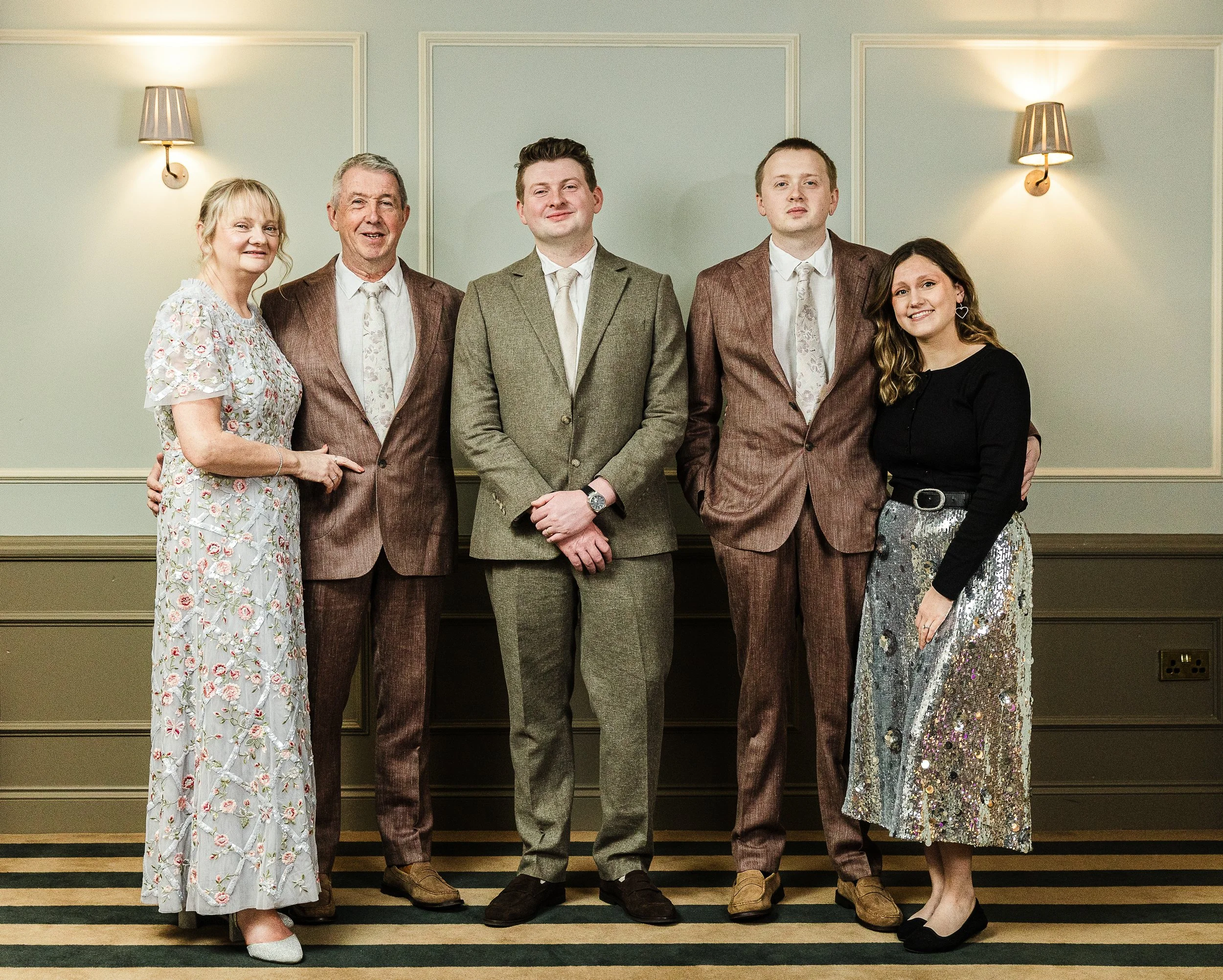 Formal group photo  of a groom and his family on his wedding day in hertfordshire