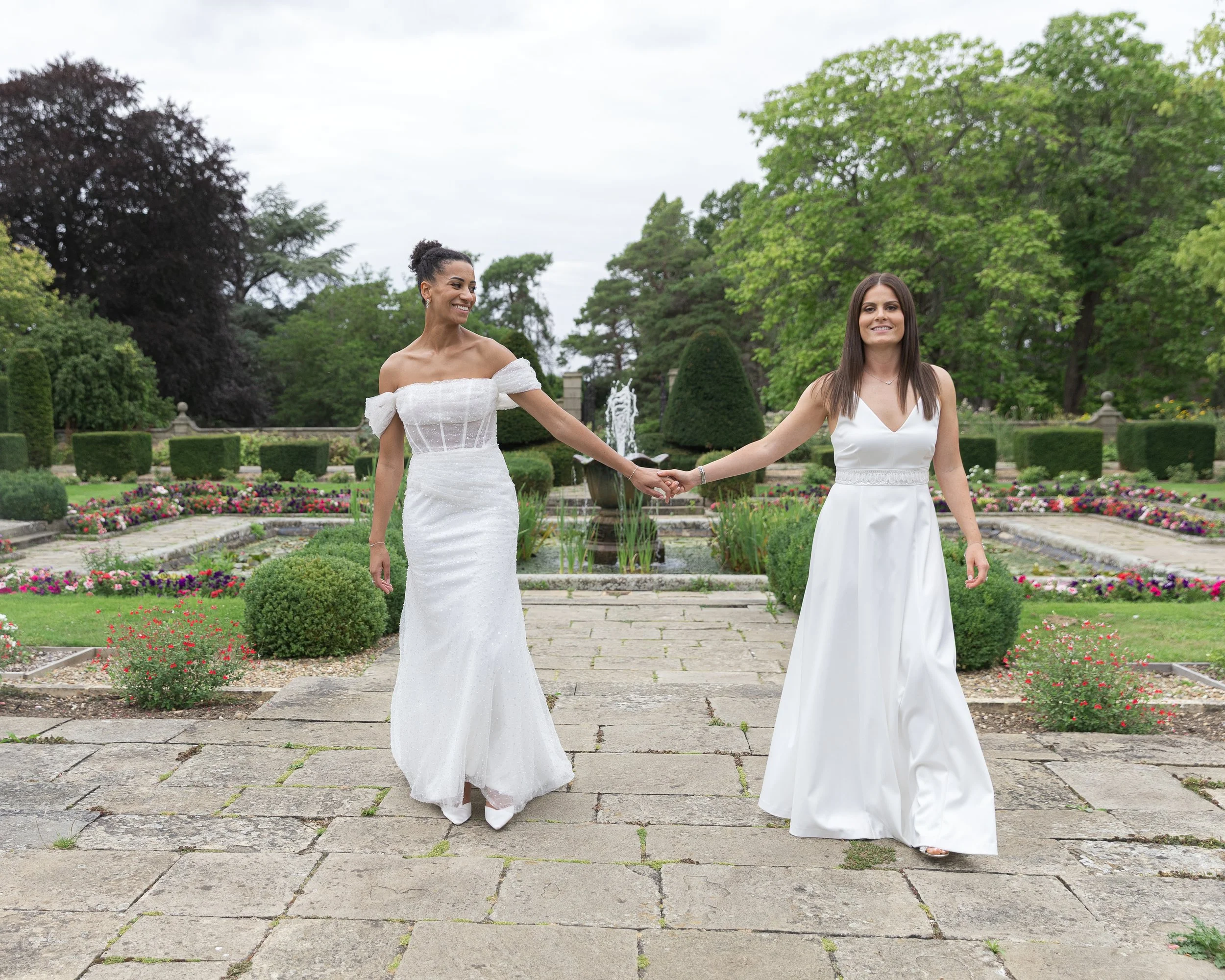 Two brides at their same sex wedding at Fanhams Hall in Hertfordshire