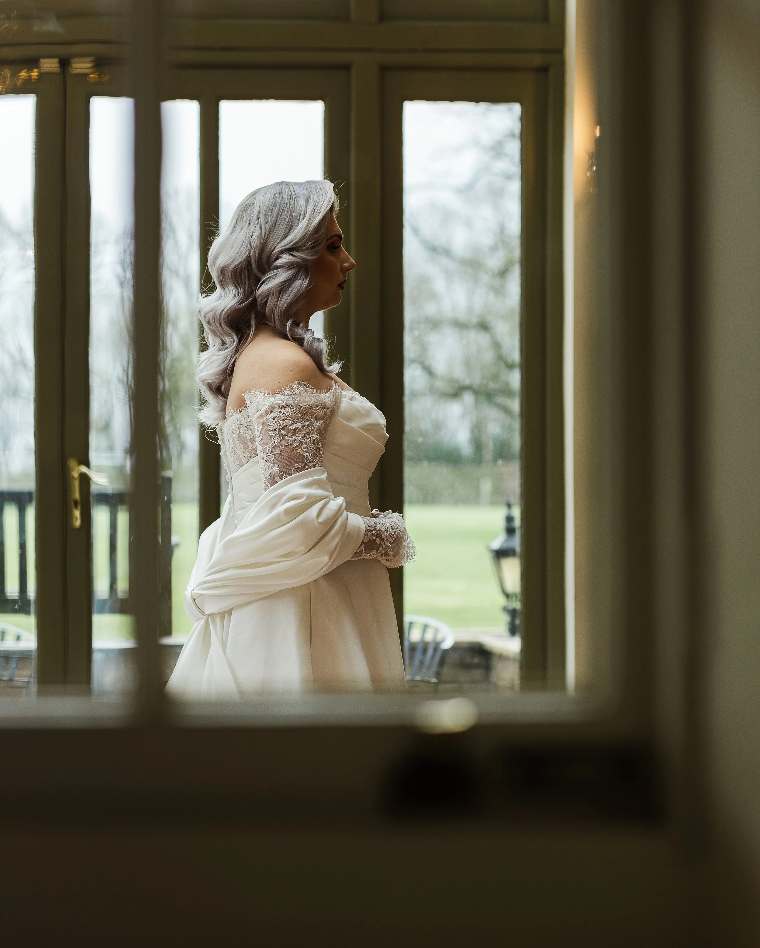A bride on her wedding day at Offley Place Hertfordshire