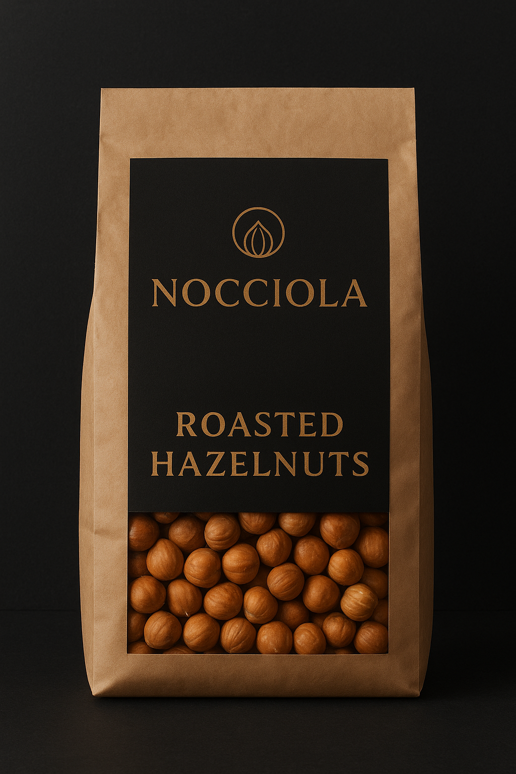 A brown paper bag of roasted hazelnuts with a black label and gold text, featuring a small logo at the top.