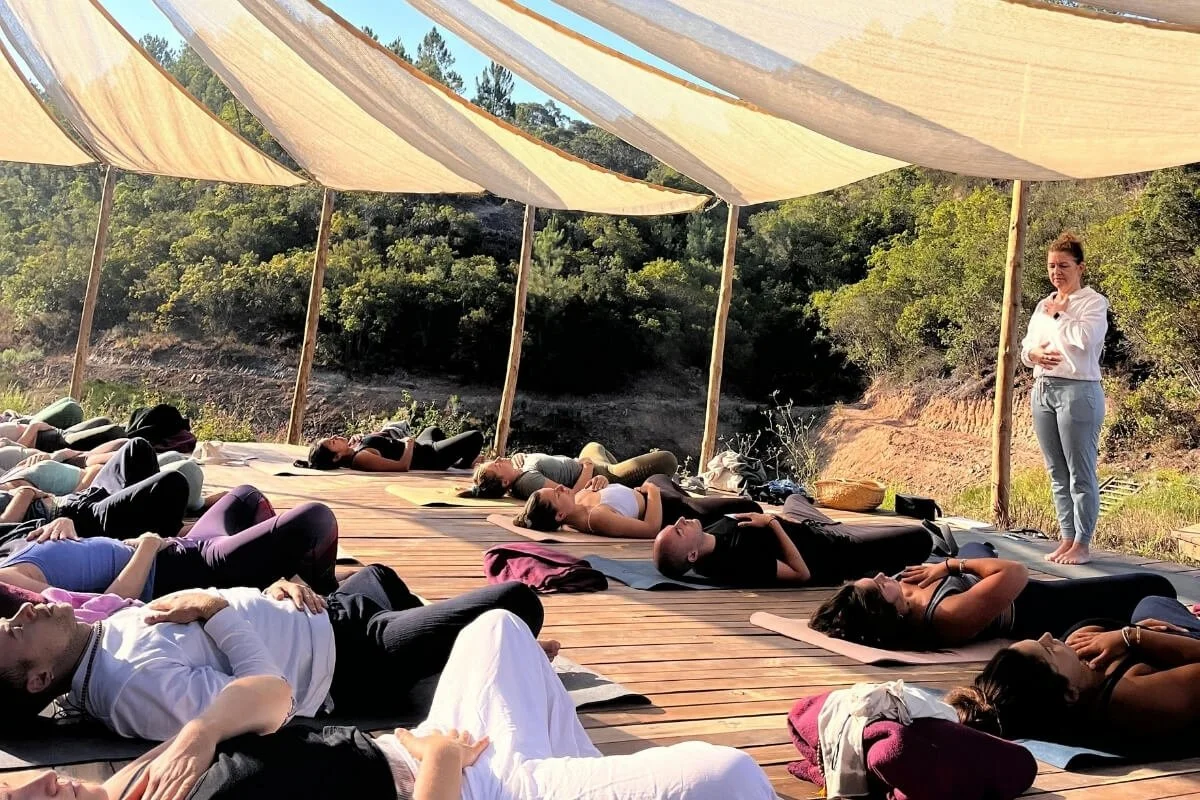 Morning yoga practice at Ancestral Academy's teacher training retreat in Aljezur, Portugal