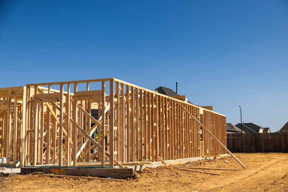 House frame under construction with wooden beams