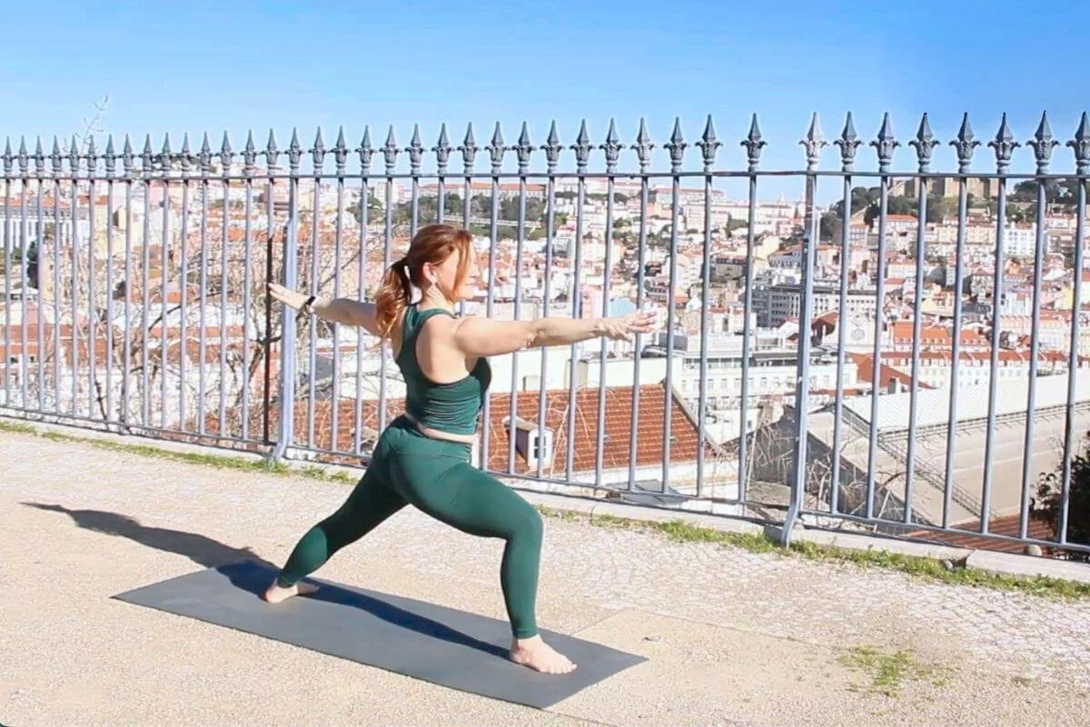 Dr. Trish Corley practicing yoga in Lisbon, Portugal, home of her yoga teacher training in Europe