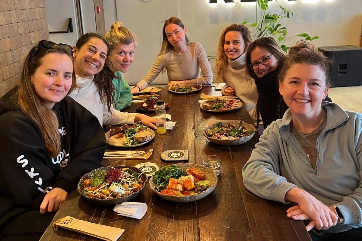 Students gathered for lunch during a Rocket Yoga teacher training in Lisbon, Portugal