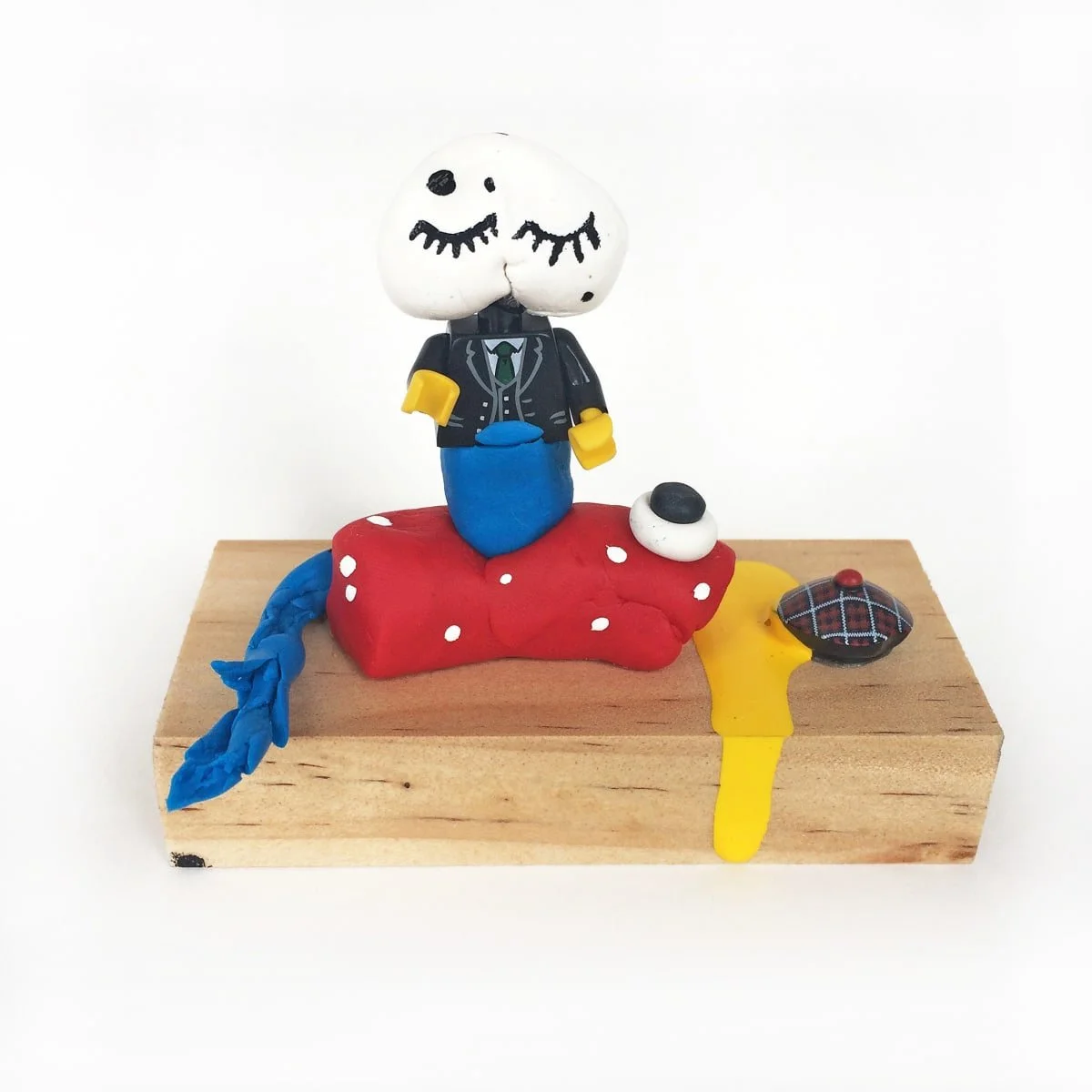 Artist Exposed as Travelling Sales Person, 2016, Polymer Clay, acrylic, Lego — 9.5 x 4 x 7.5 cm.