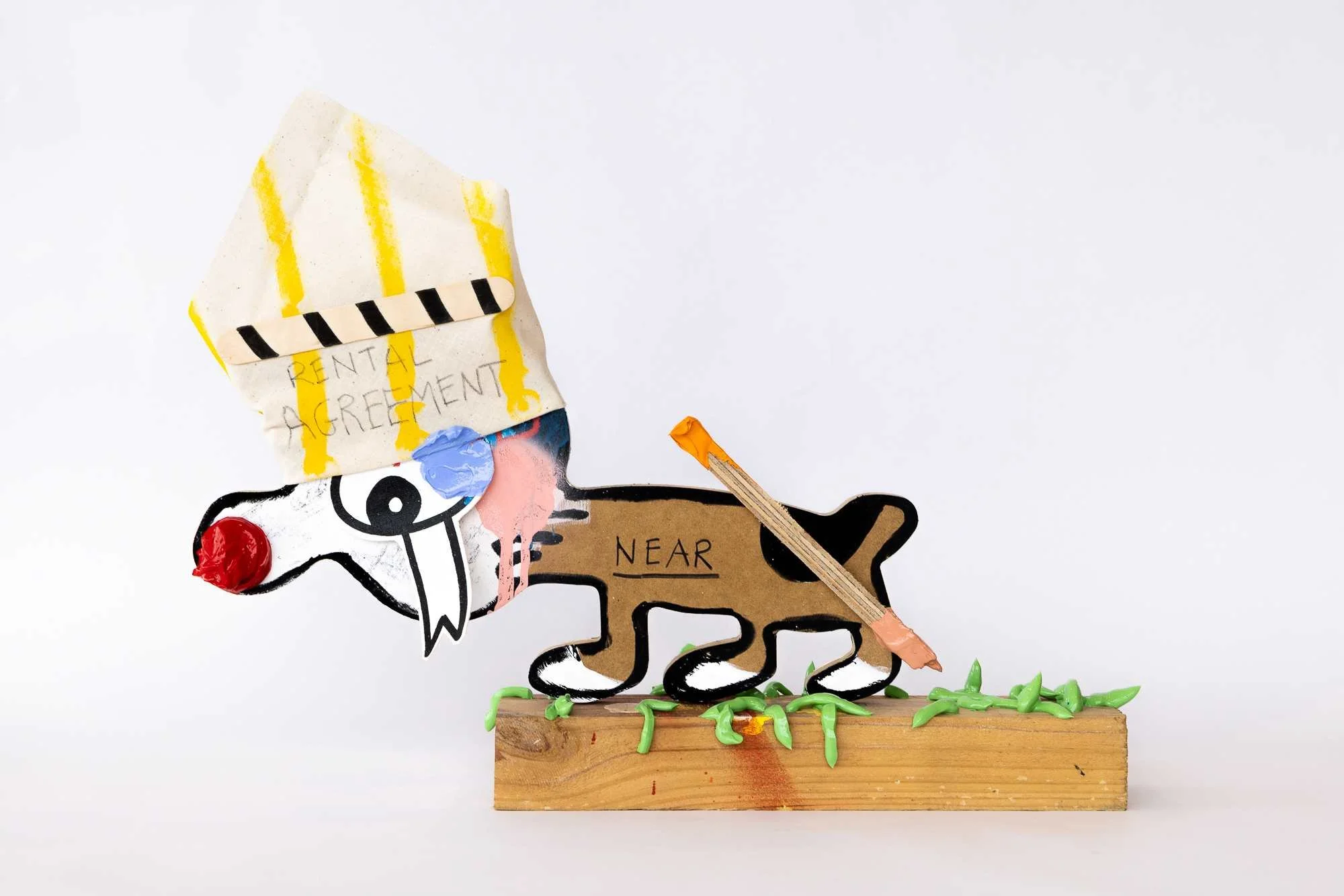 Front - Artist (two faced litigator), 2023. Acrylic, charcoal, cotton canvas, PVA glue, MDF, wood — 36cm(H) 48cm(W) 8cm(D)⁣.