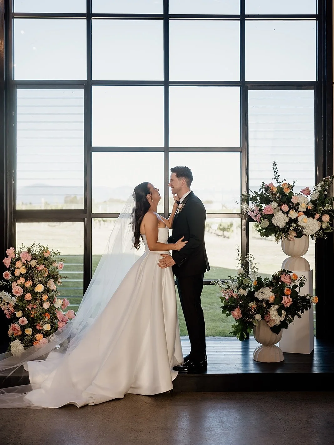 There’s something truly magical about the windows at @zonzoestate… they frame Victoria’s beauty in the most iconic way and give light to so much love. 
Liv and Jordy decided to get married just there. And given that their love sto
