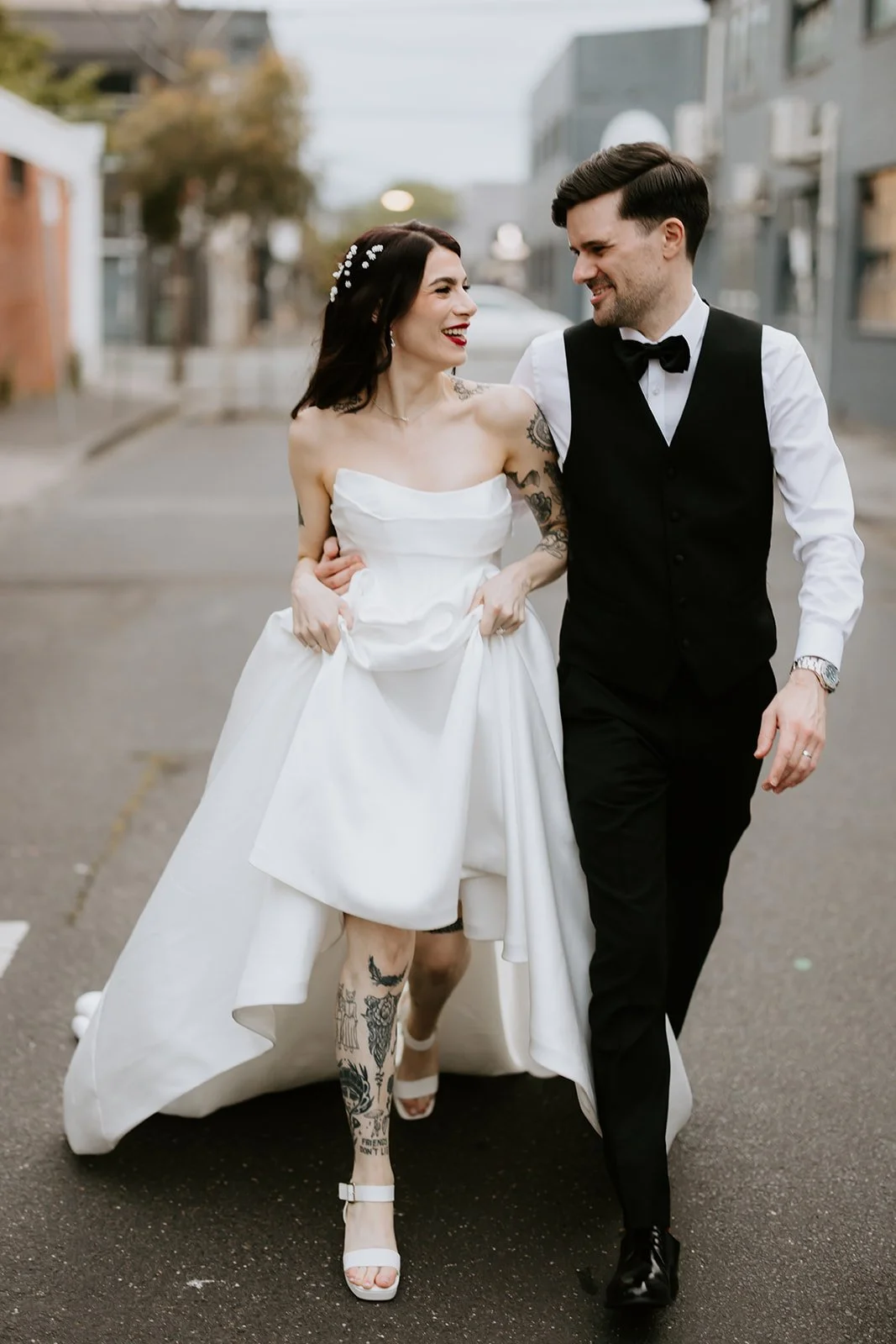 Maddy's leg and arm tatts looking sick on her wedding day to Tom