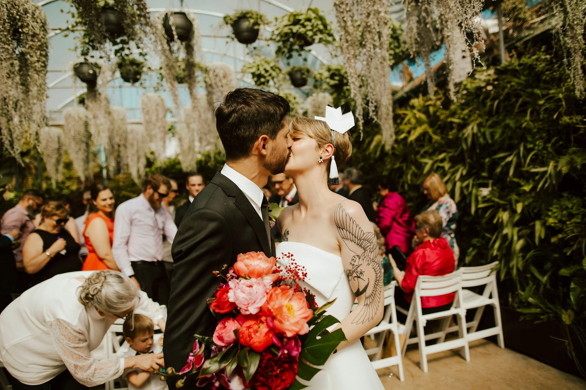 nanette-josh-glasshaus-outside-wedding-melbourne-ceremony-kiss.jpg