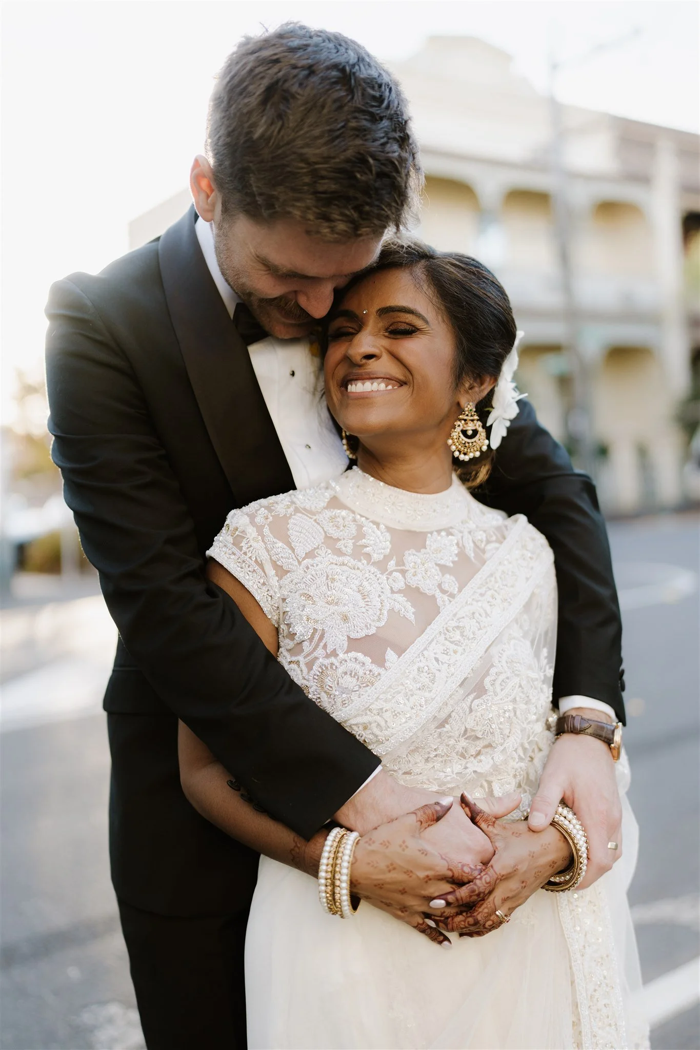 tim-revathi-rupert-on-rupert-wedding-collingwood-elsa-campbell-embrace.jpg
