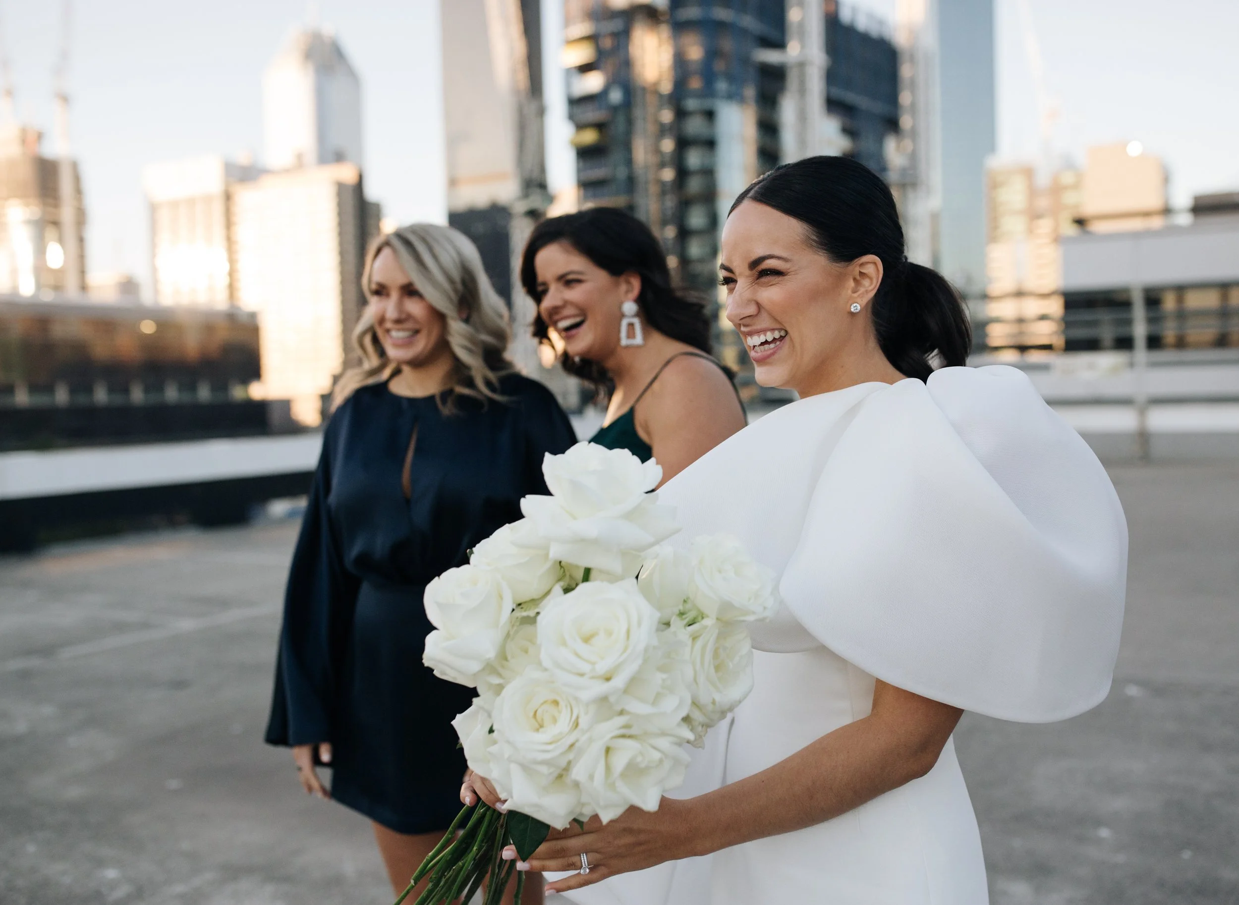 shenay-joe-recoleta-melbourne-wedding-rooftop-smiles.jpg
