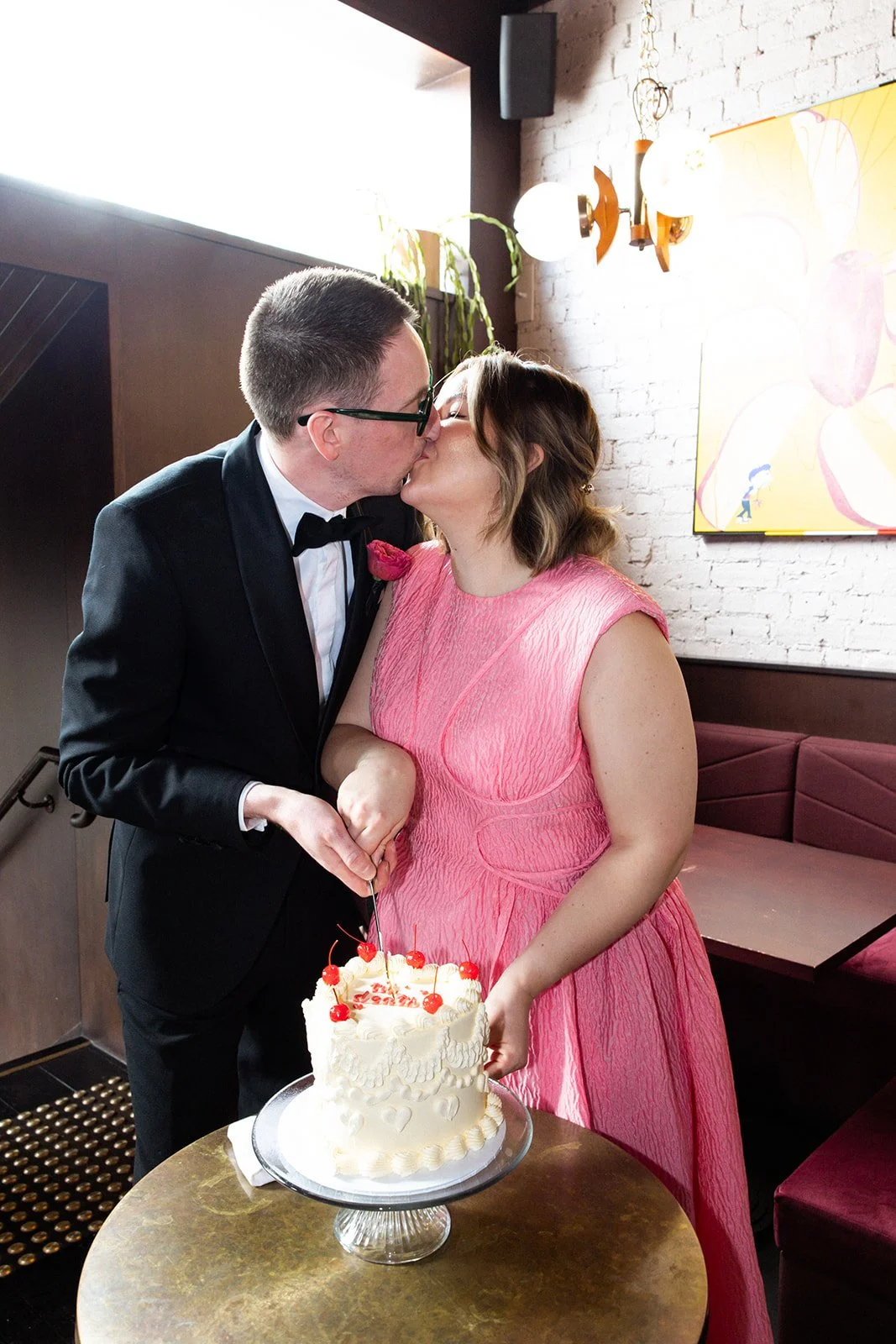 ally-simon-poodle-wedding-melbourne-cake-cutting.jpg
