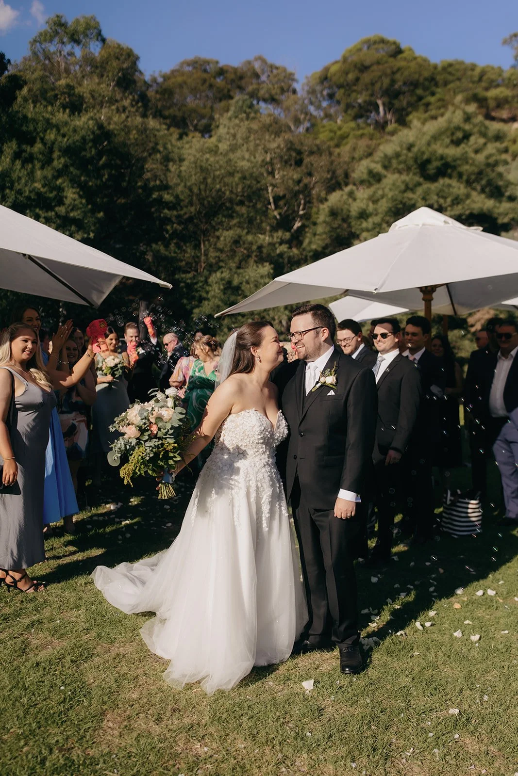 nathan-rachael-collingwood-childrens-farm-wedding-celebrant-first-kiss.jpg
